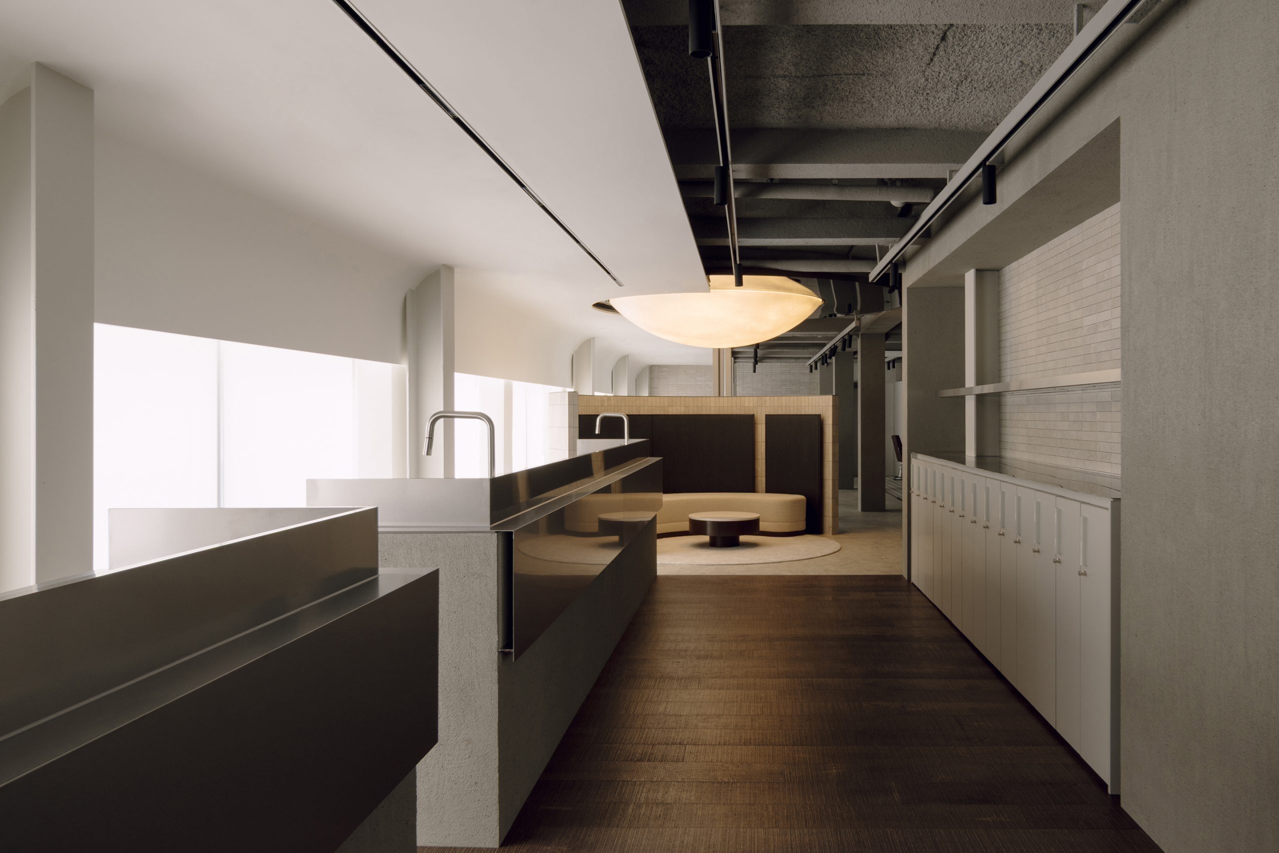 View through the linear salon towards the waiting area