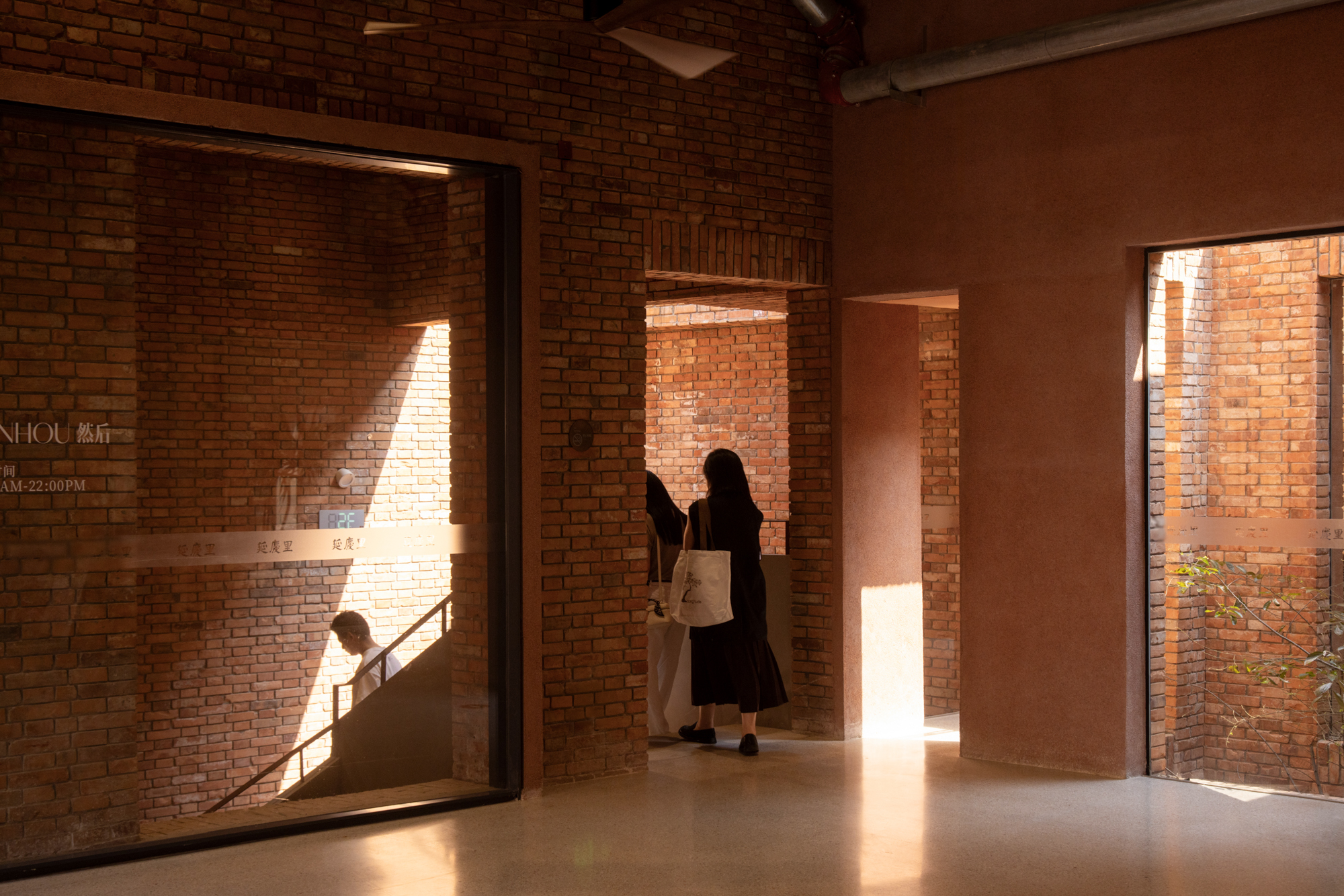 Light and shadow move through the connected atriums and walkways