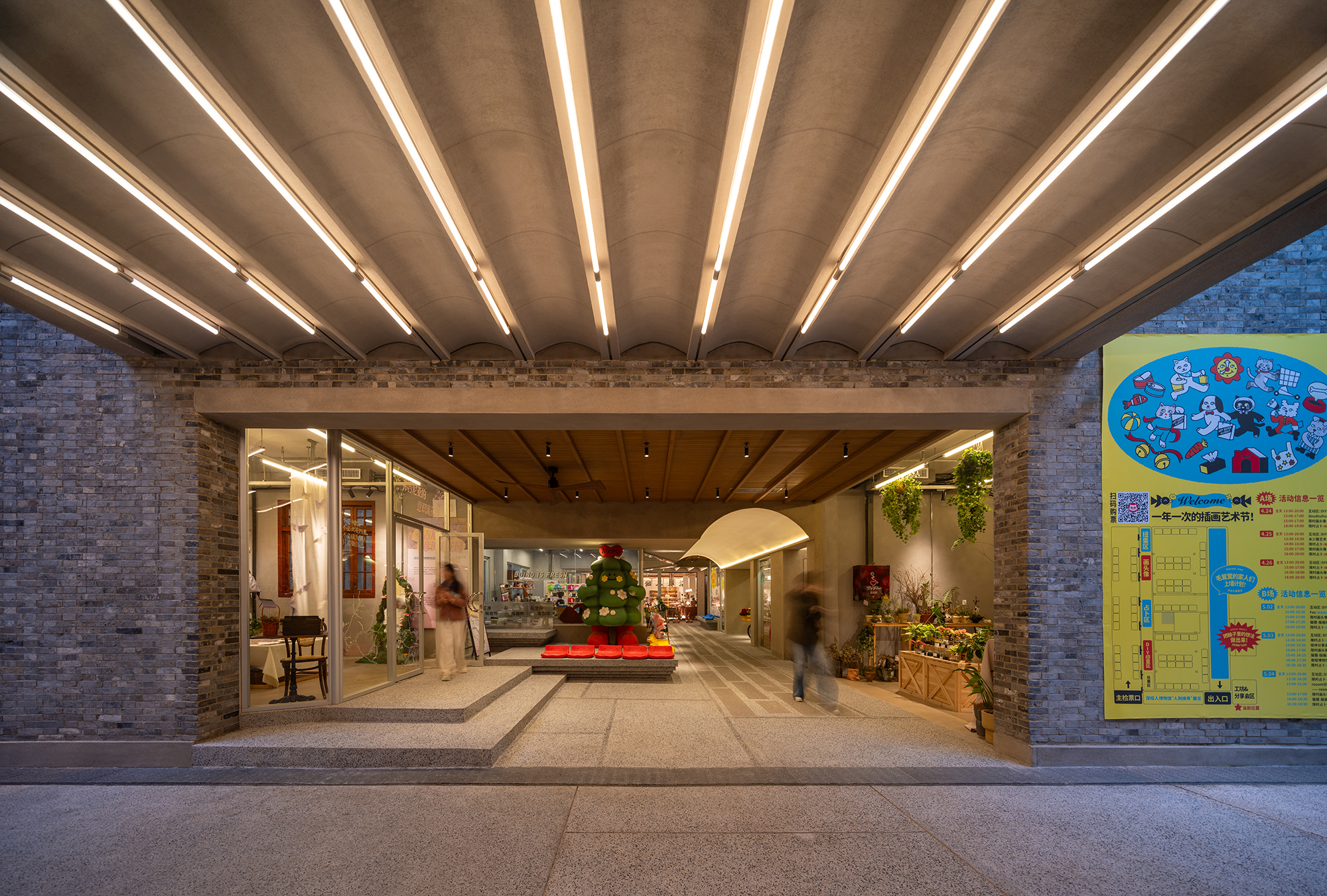 A small market occupies one of the renewed communal spaces