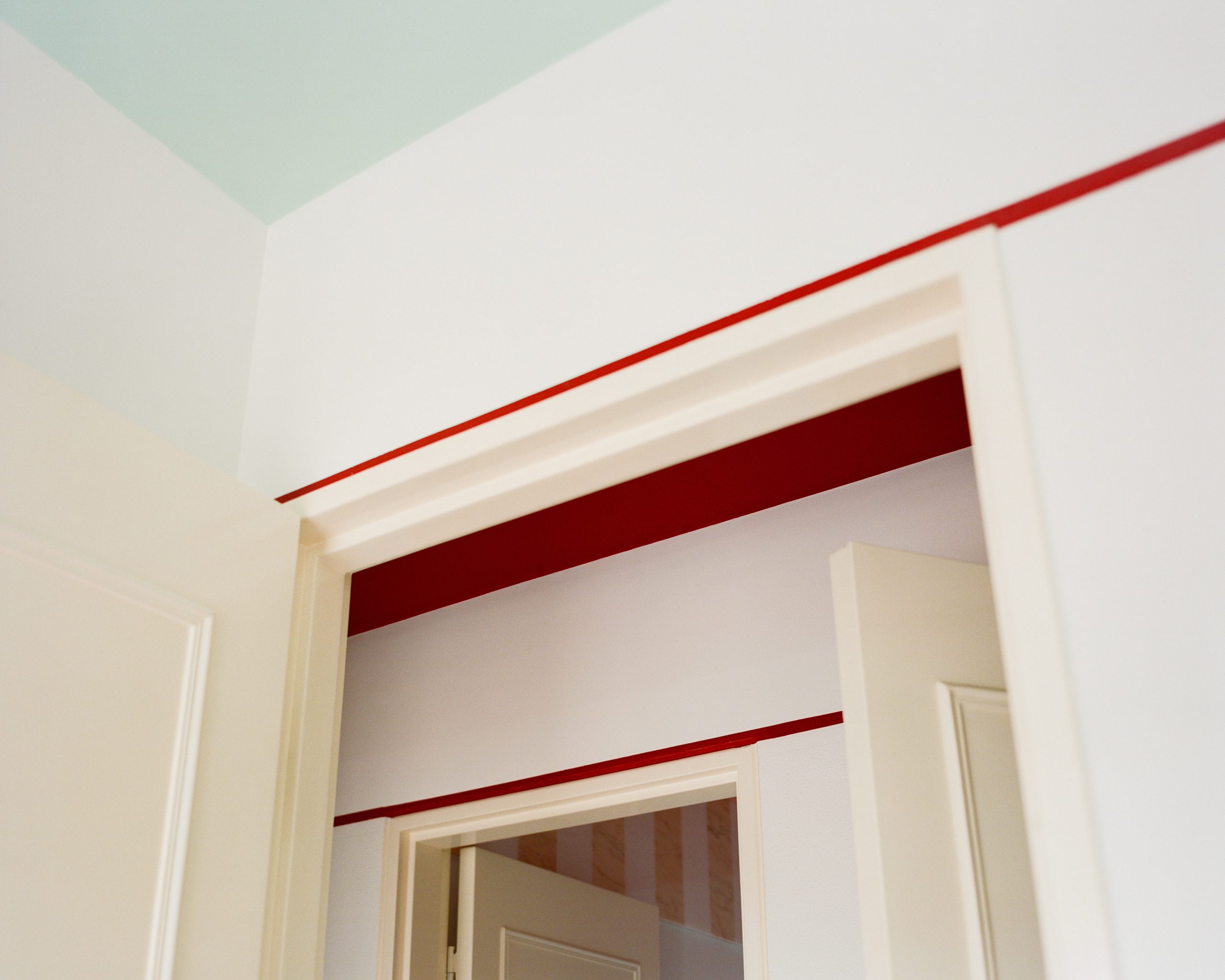 Circular bedroom door detail in the Fabron apartment renovation