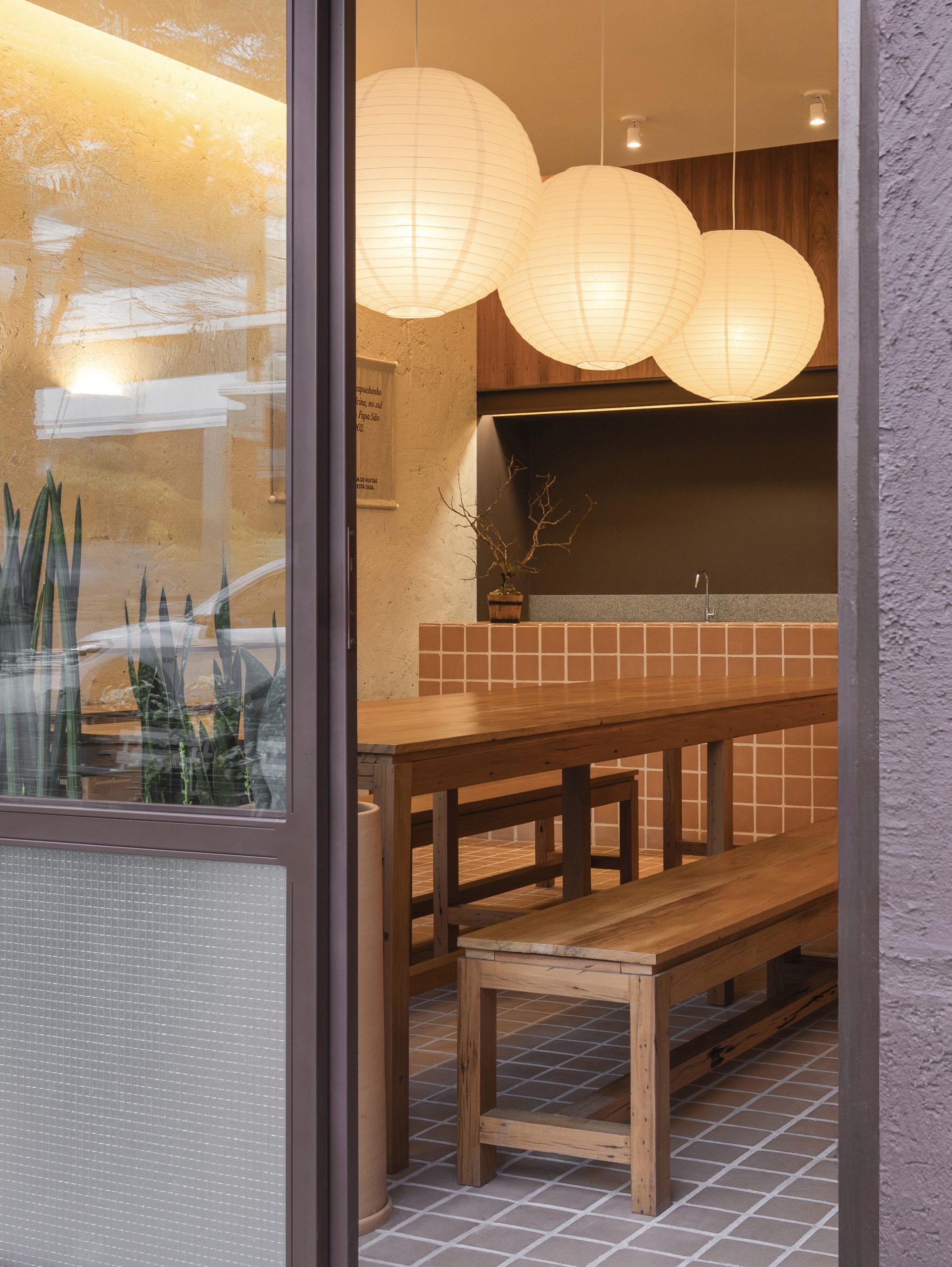 Close view of ceramic tiles and timber furniture