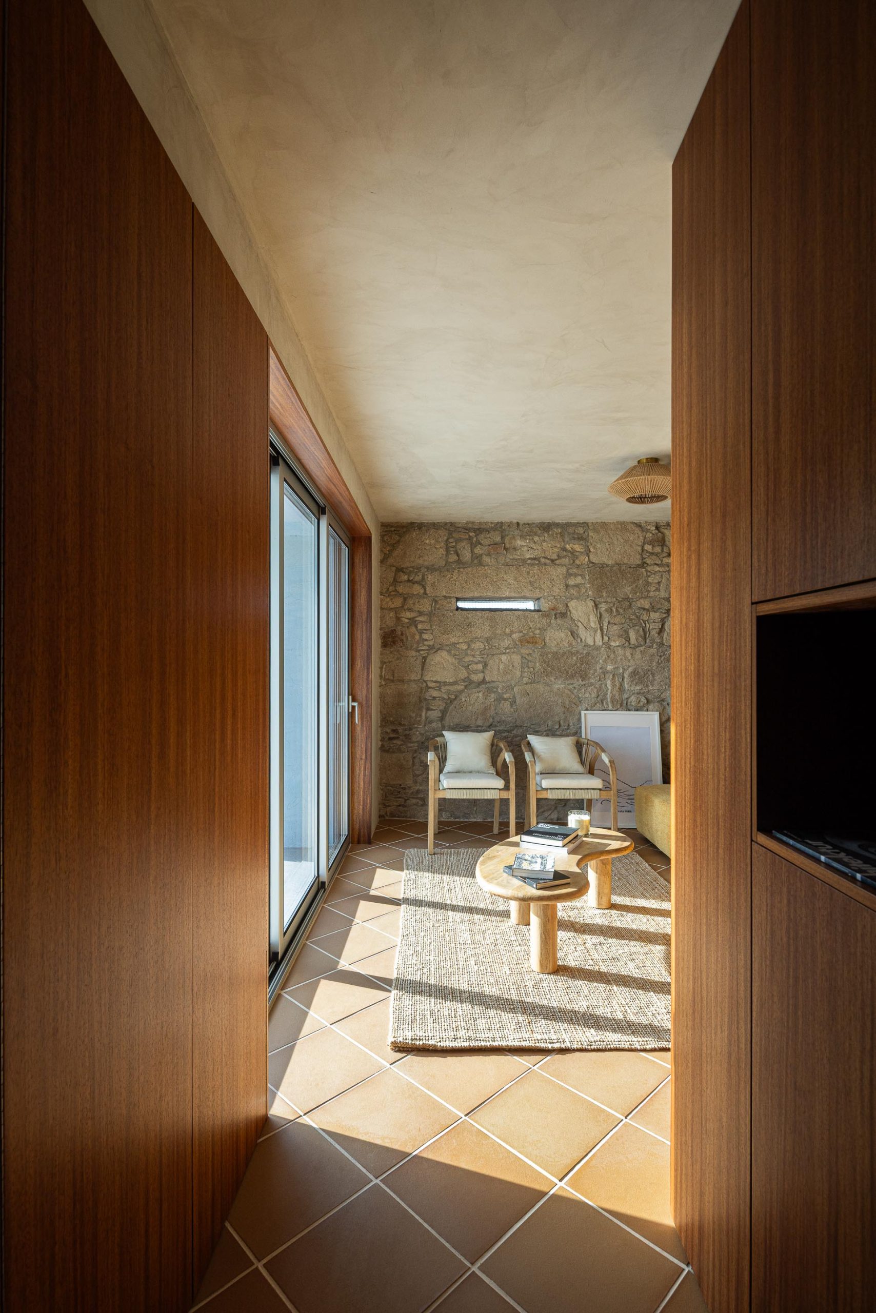 Casa Âncora interior with restrained natural materials