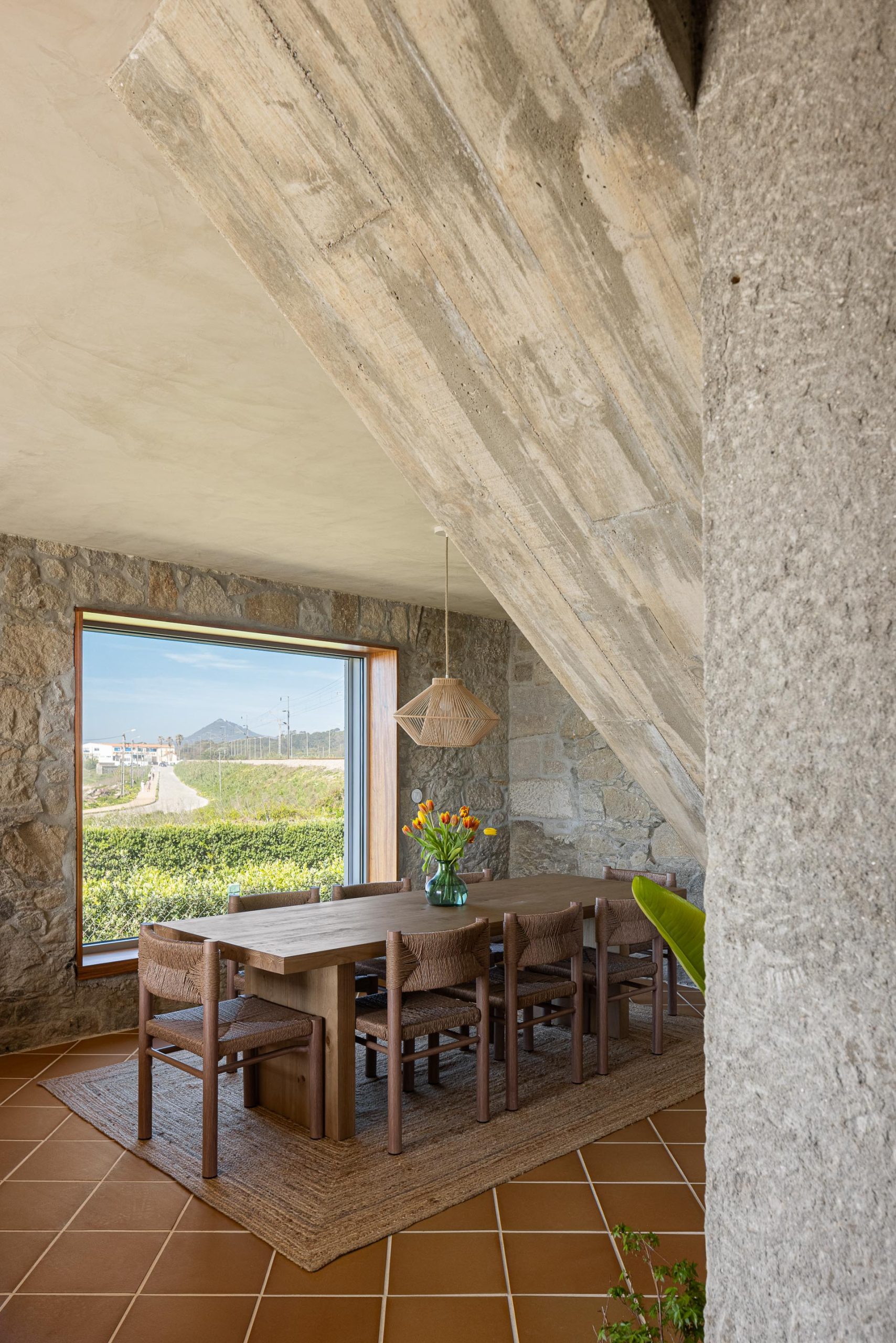 Roof terrace of Casa Âncora overlooking sea and rocks