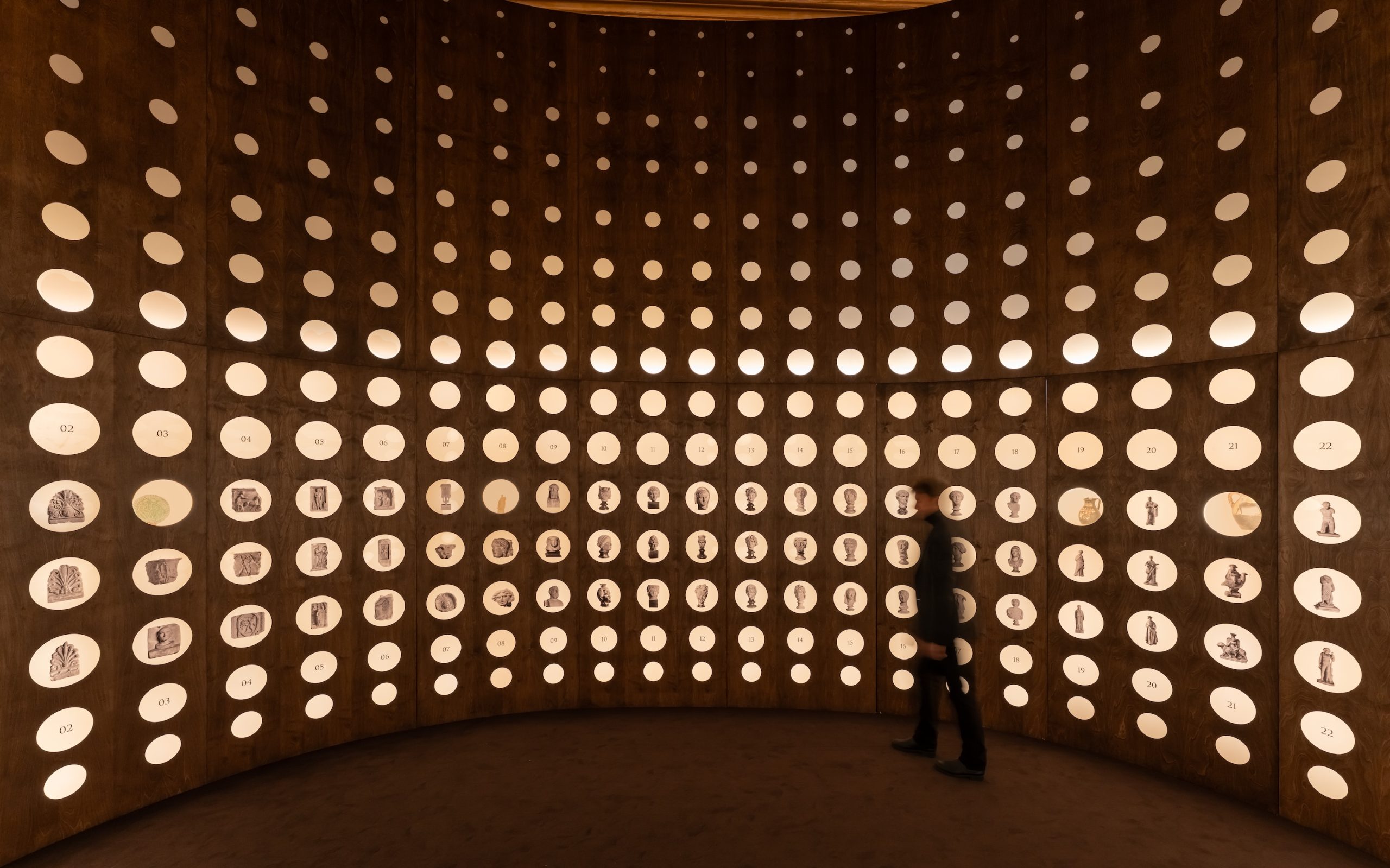 Numbered niches in NArchitekTURA's stereoscope-inspired wall