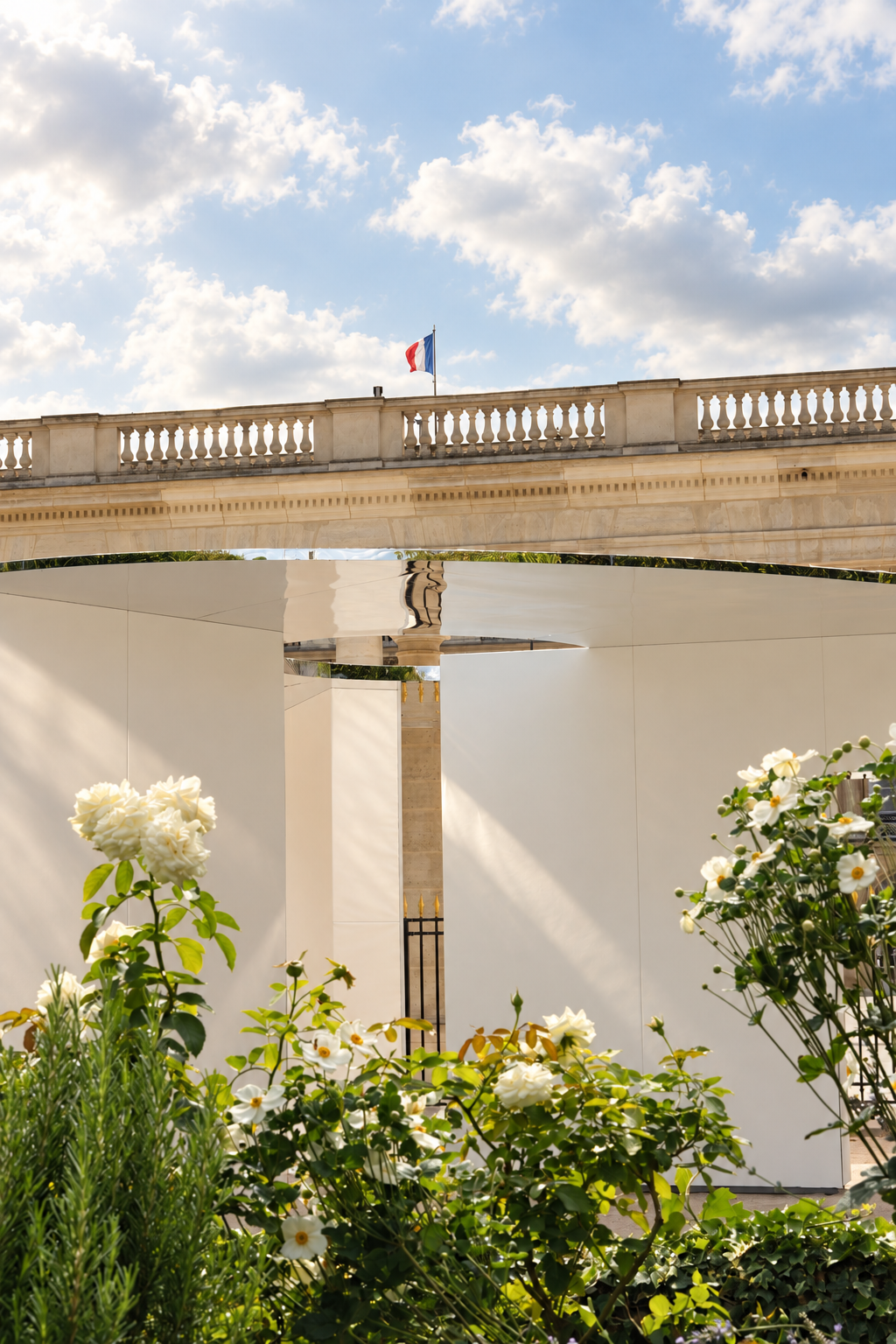The Pavilion of Time is set among the gardens and classical architecture of Palais-Royal.