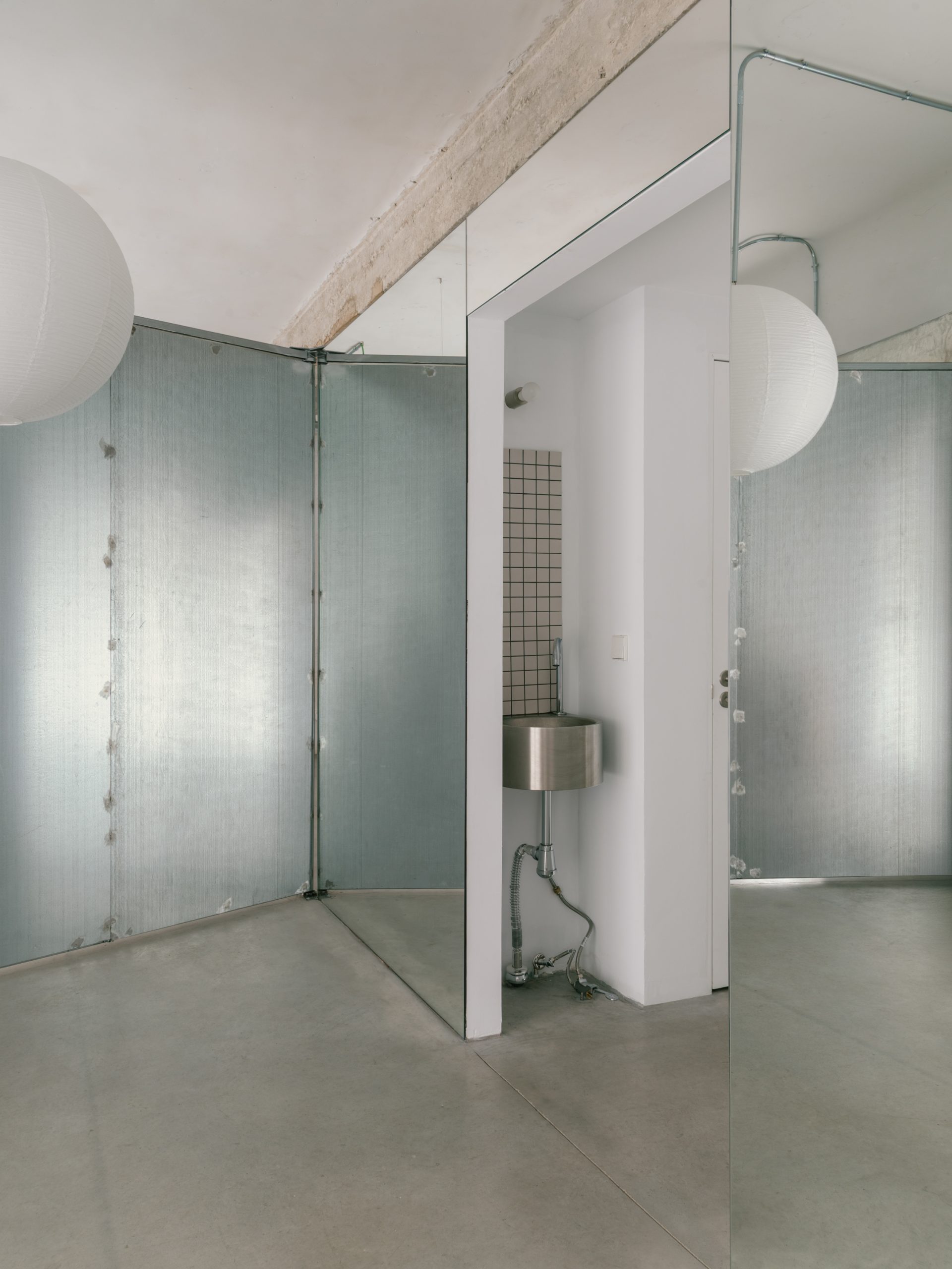 The metal wall turns to reveal the entrance arrangement.