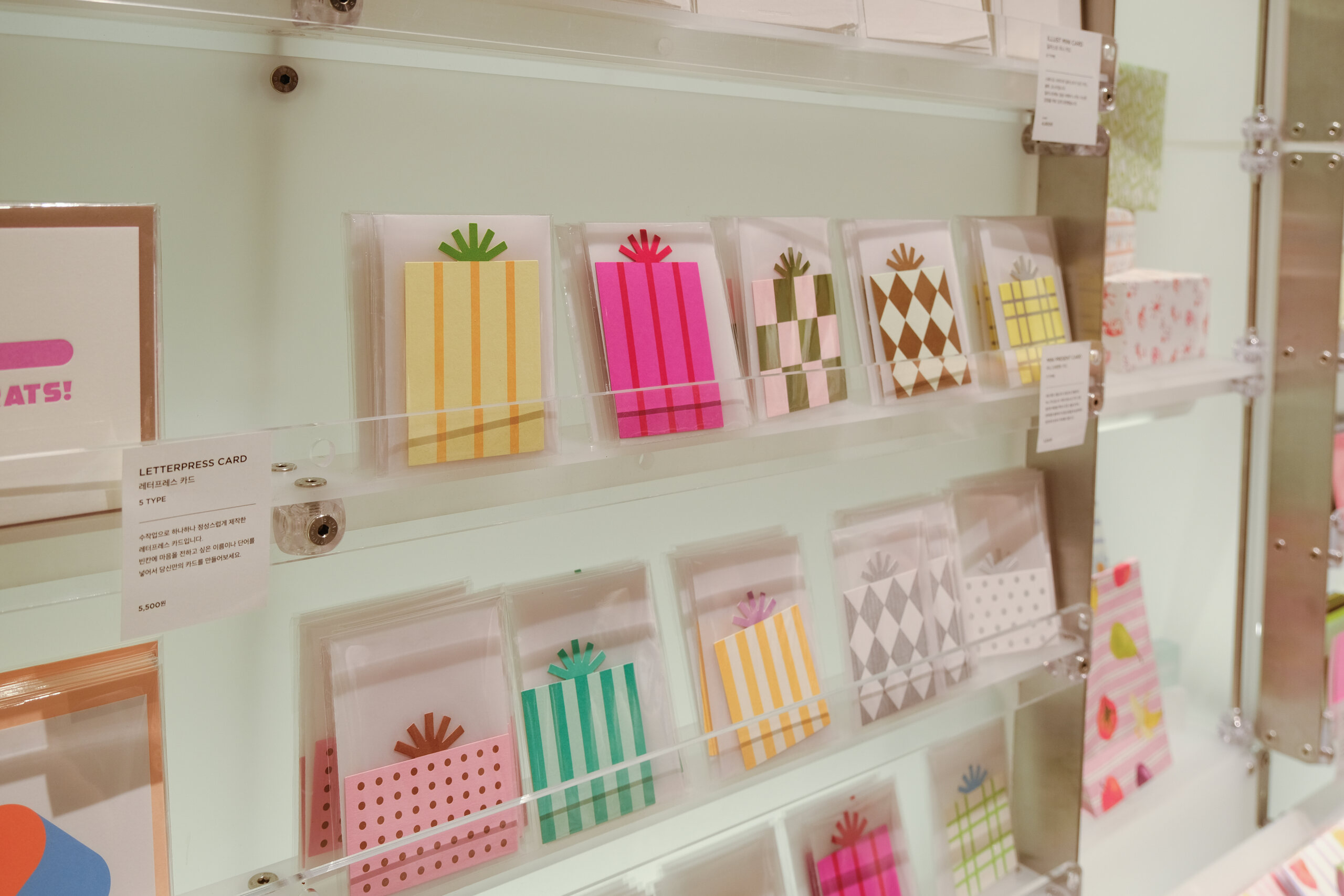 Close view of cards presented on translucent shelving