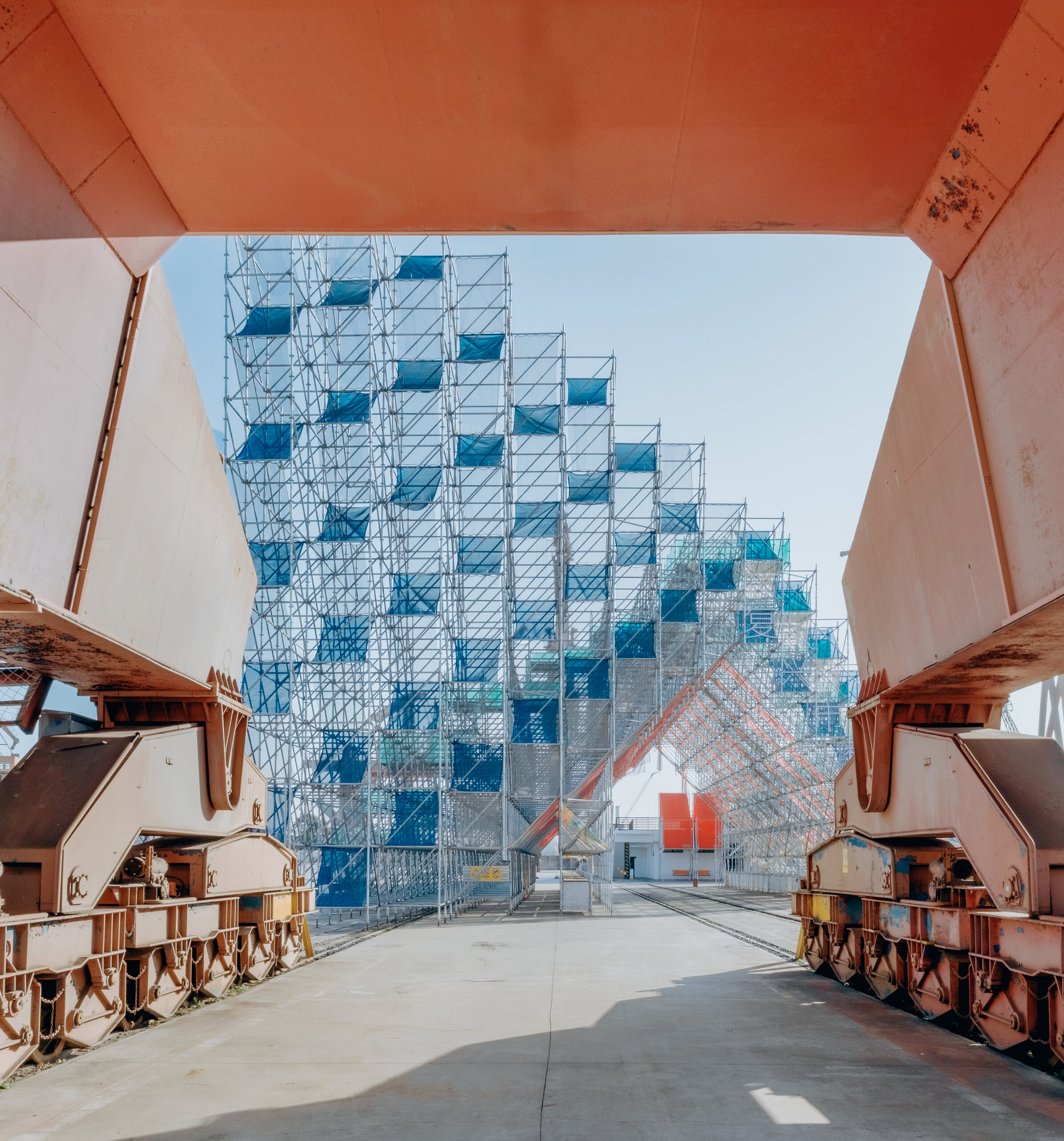 Mount Bazaar framed by the industrial structures of Fuxing Island
