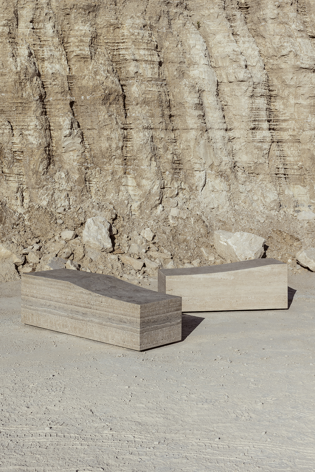 Mon travertine bench with an integrated side table