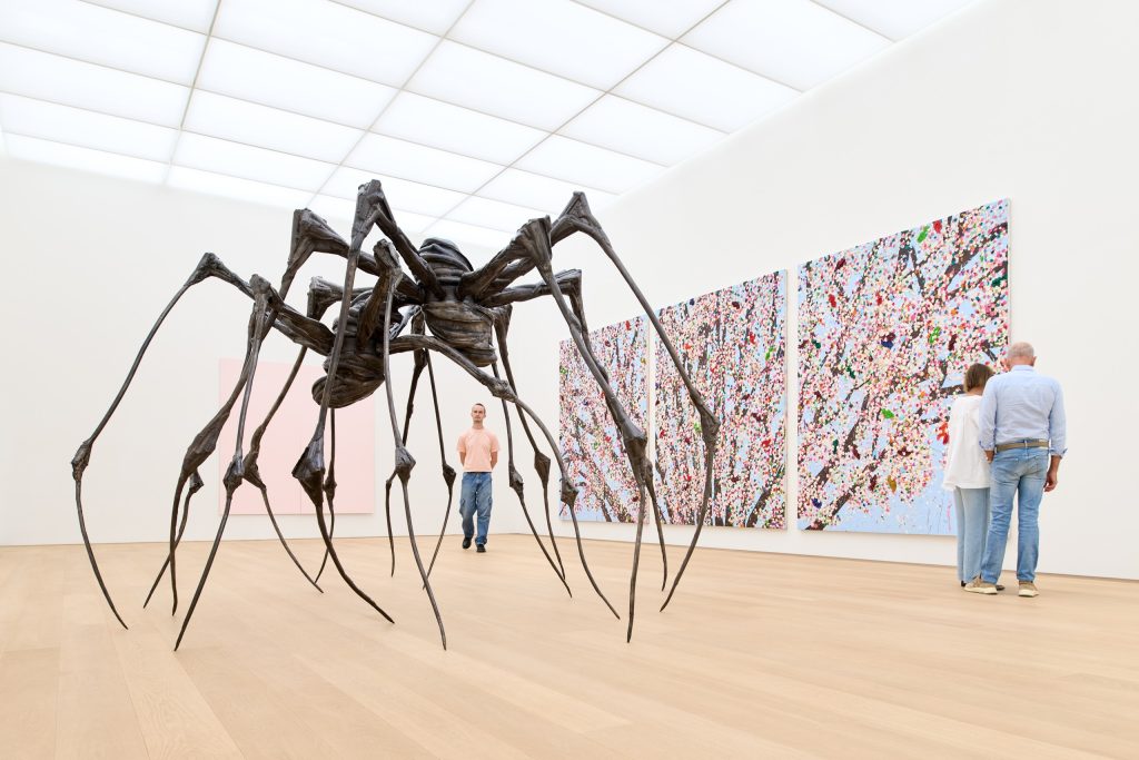 Louise Bourgeois’s Spider Couple in front of Damien Hirst’s Hidden Secret Blossom at Museum Voorlinden.