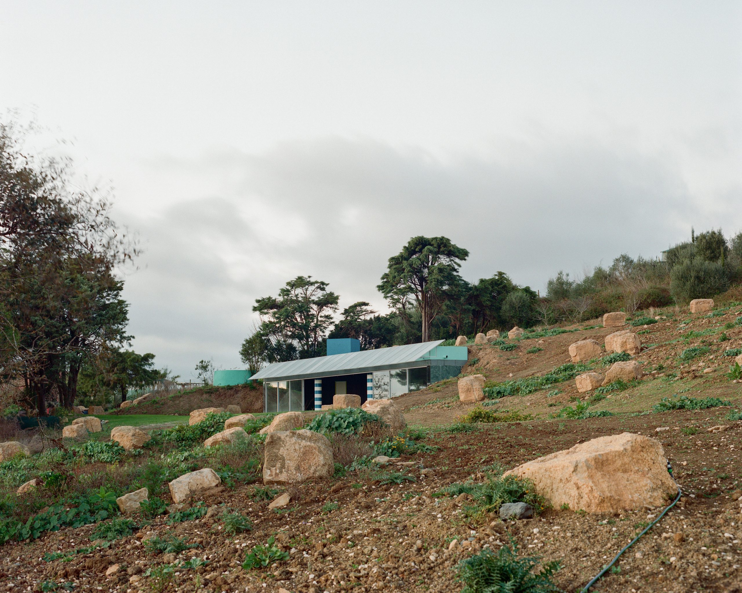 Cookie Cutter Retreat: exterior view in context relation with the landscape
