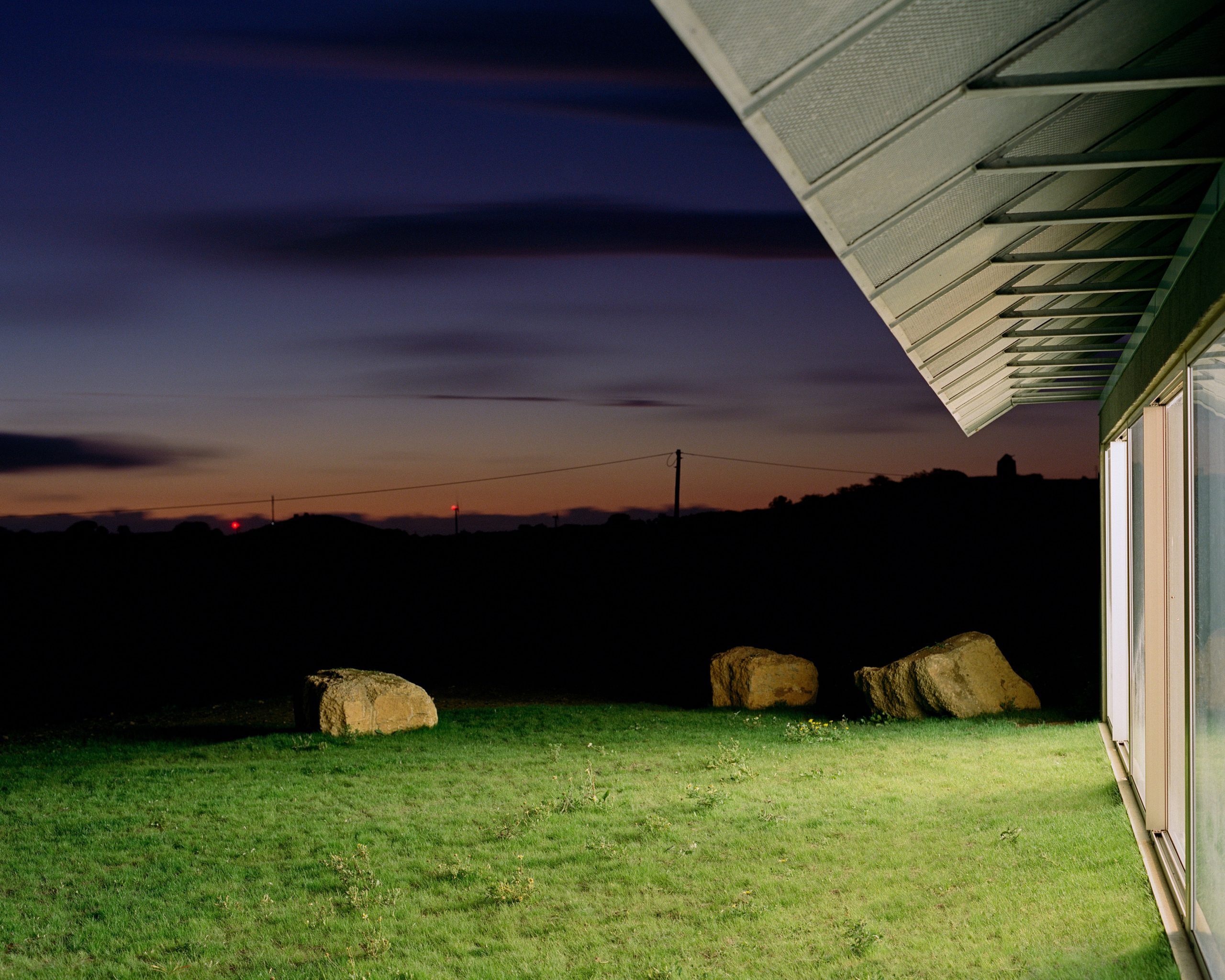 Cookie Cutter Retreat: exterior view S building relation with the horizon