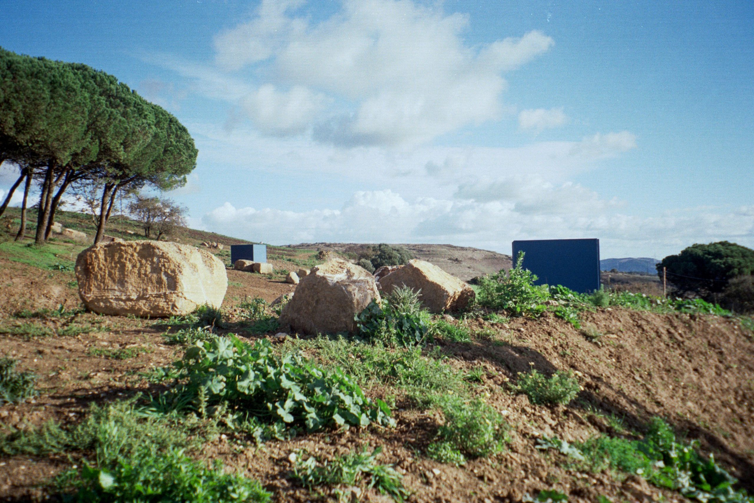 Cookie Cutter Retreat: buildings hidden by the landscape