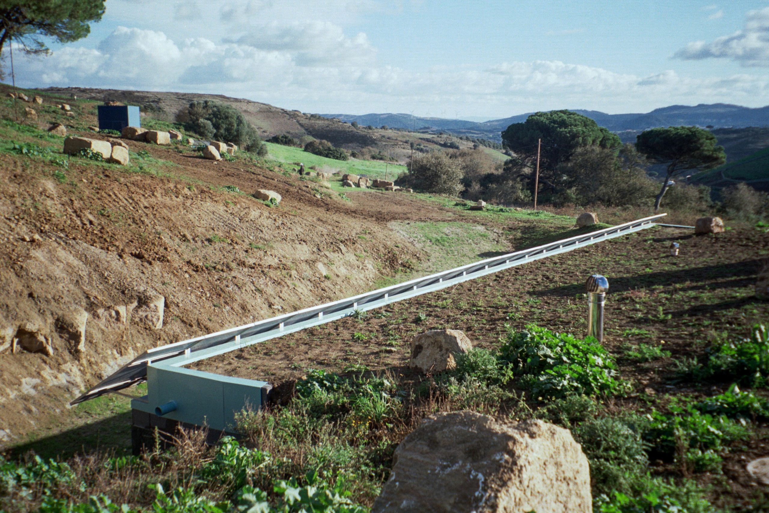 Cookie Cutter Retreat: buildings hidden by the landscape