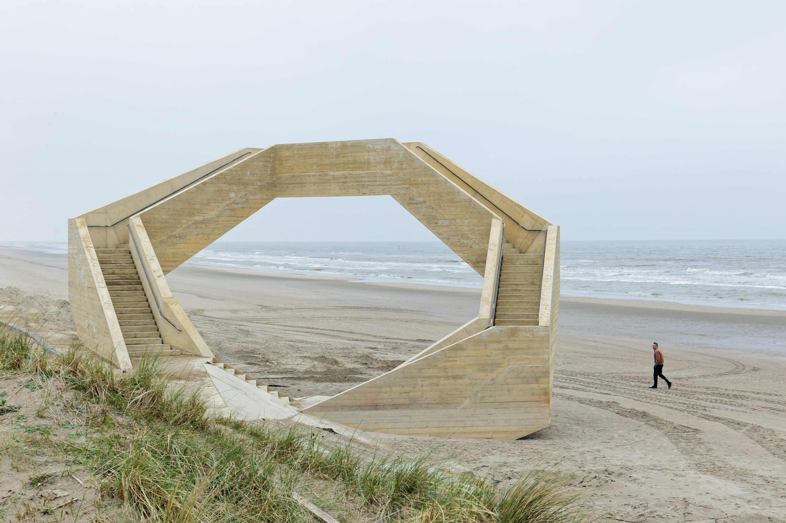 The concrete loop frames a view of the North Sea.