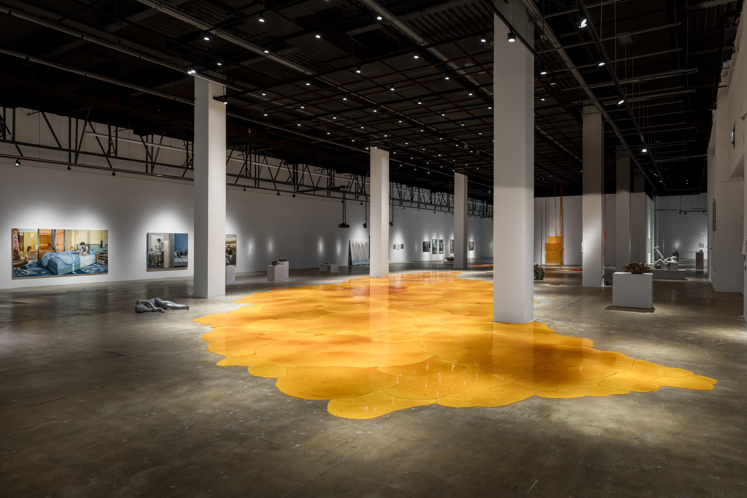 Yellow floor installation and exposed columns in Gallery 1 of the Gwangju Biennale