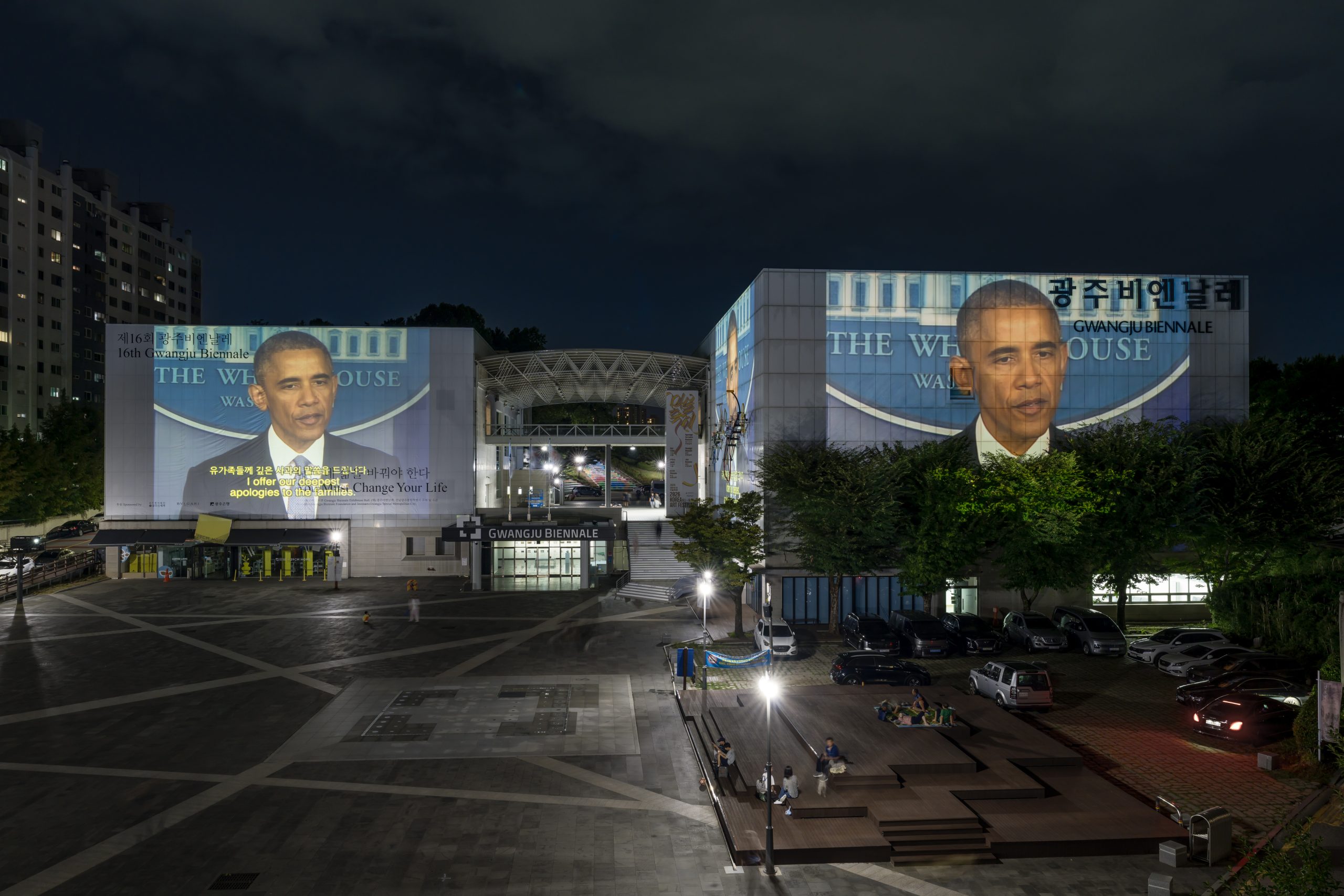 James T. Hong's Apologies projected onto the Gwangju Biennale Exhibition Hall at night