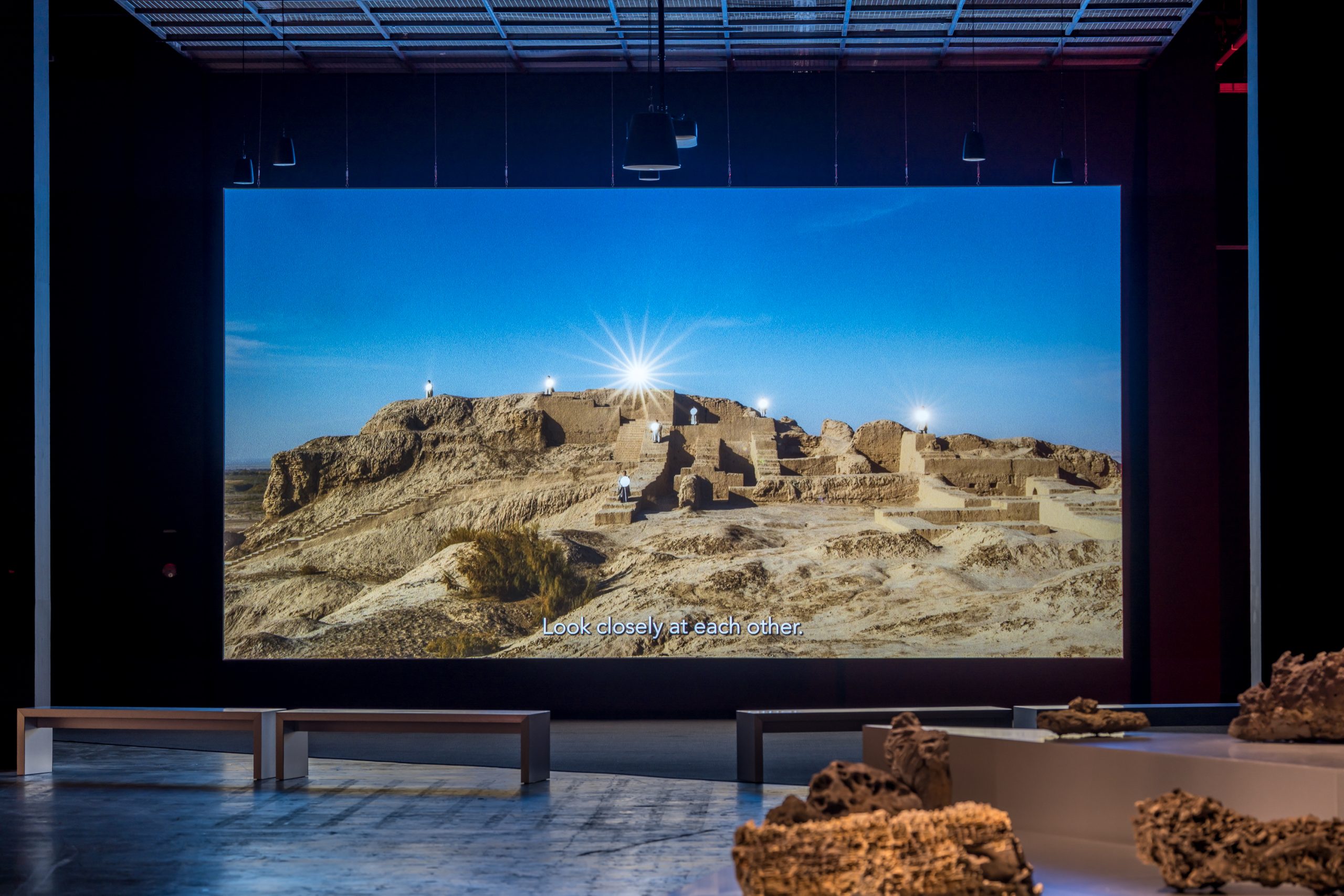 Saodat Ismailova's Melted into the Sun shown alongside volcanic specimens