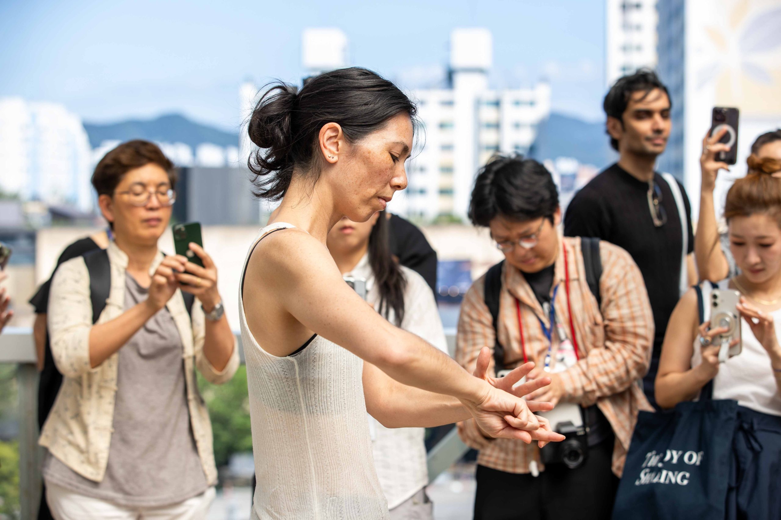 Angela Goh performing Craft among visitors at the Gwangju Biennale