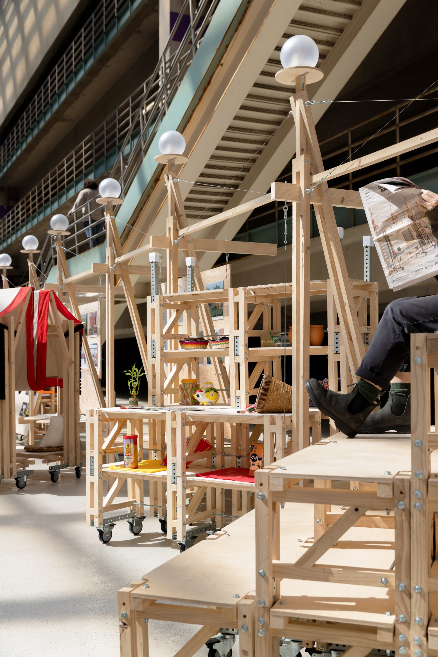 Stackable seating and shelves beside the installations, Parts of Common