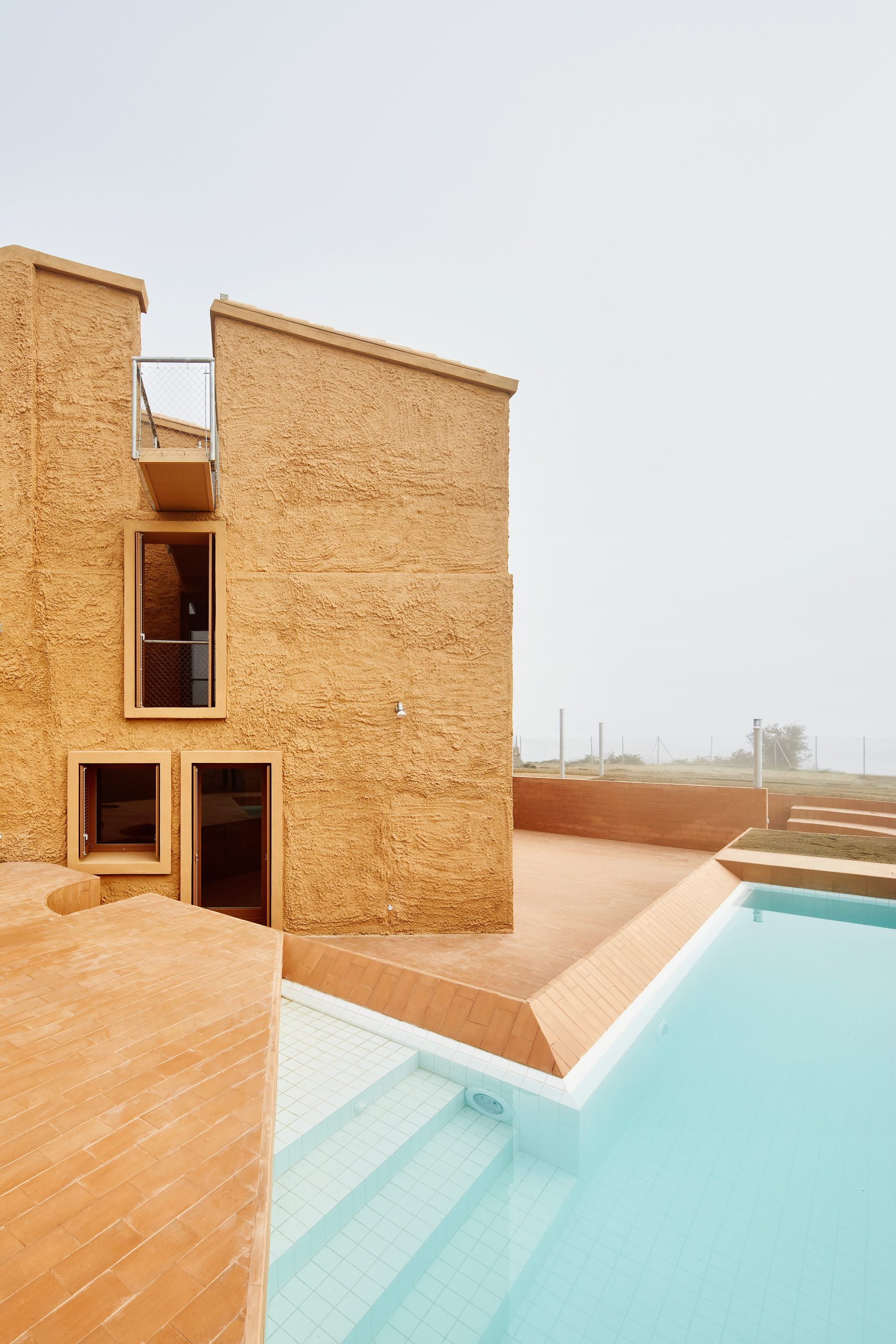 Can Migris exterior and sunken terrace by ARQUITECTURA-G