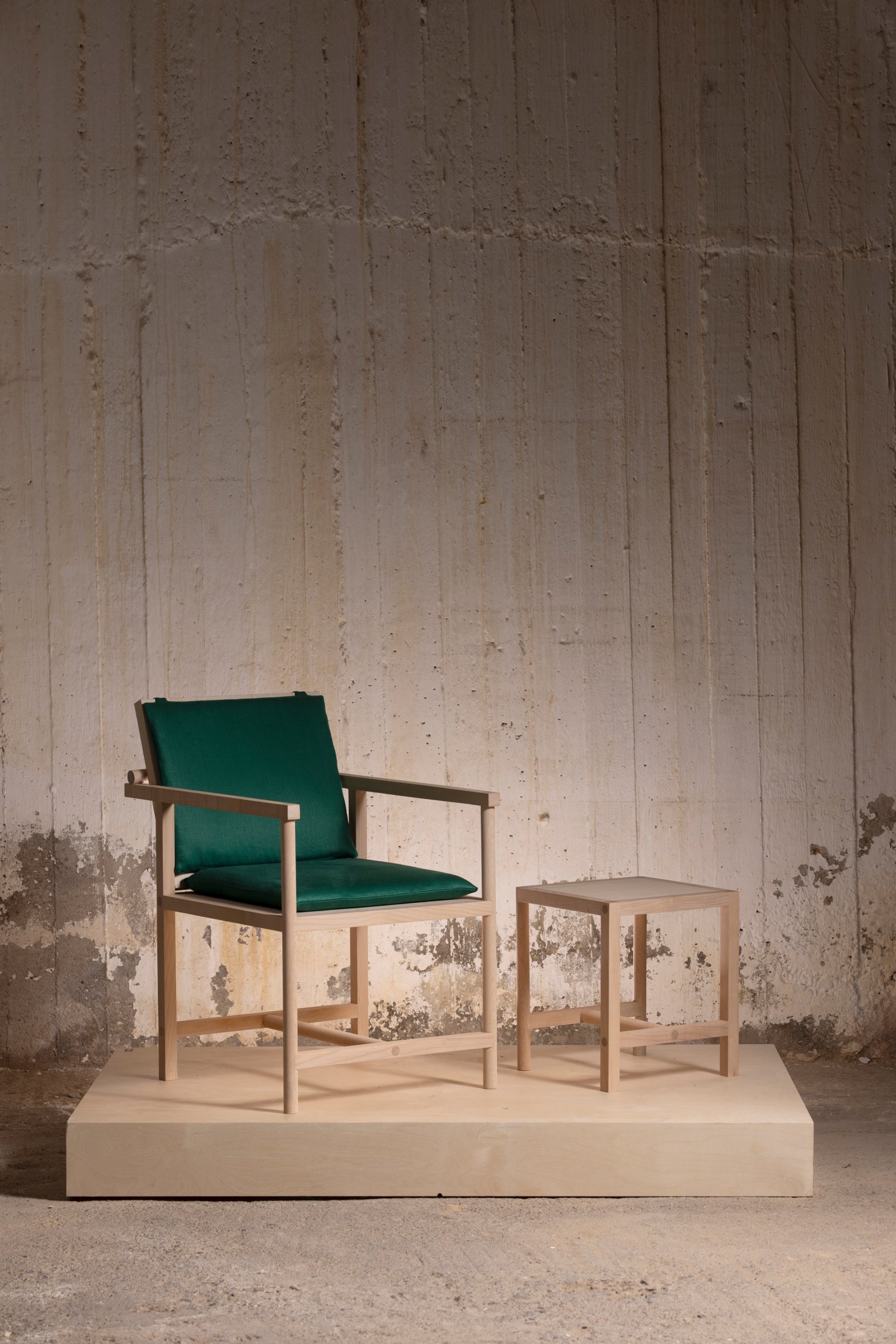 Parrot Chair and low table on a display platform