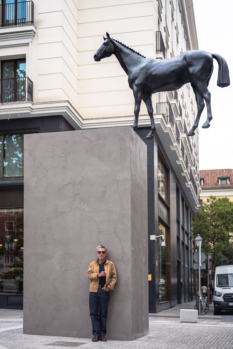 Angled view of the riderless horse extending beyond its pedestal