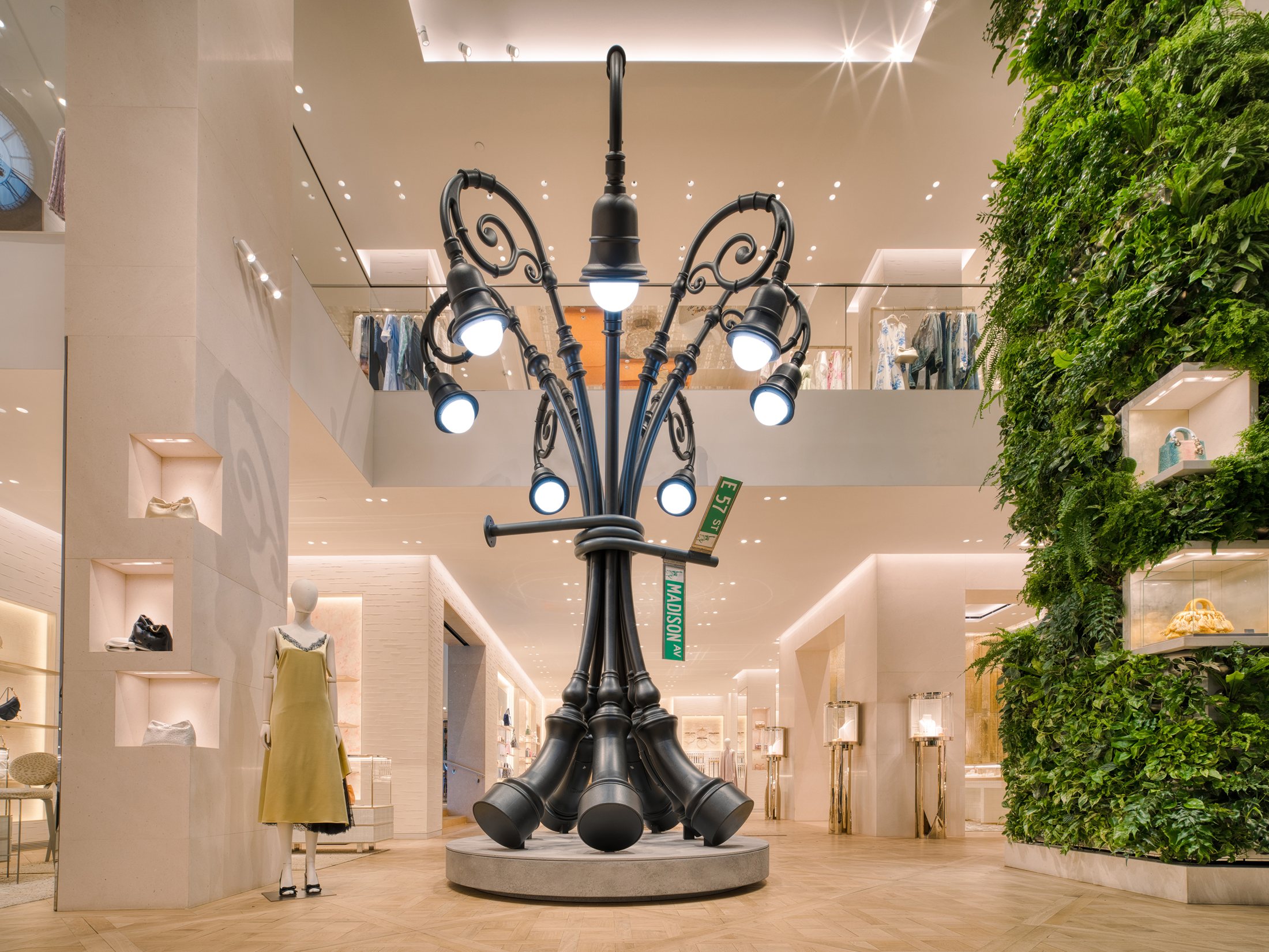 Cluster of ornamental street lamps inside House of Dior New York