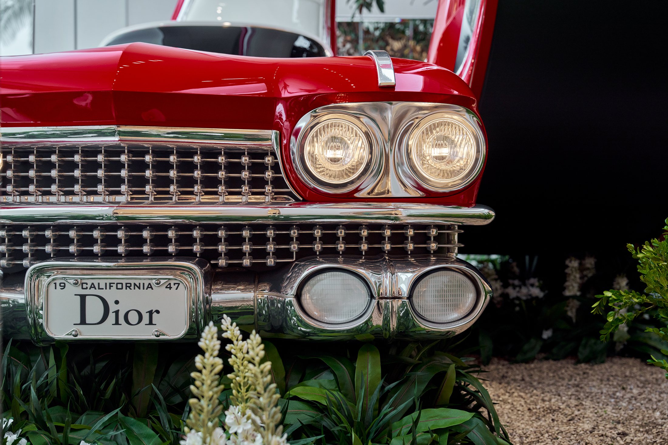 Red car grille and Dior number plate in the Beverly Hills installation