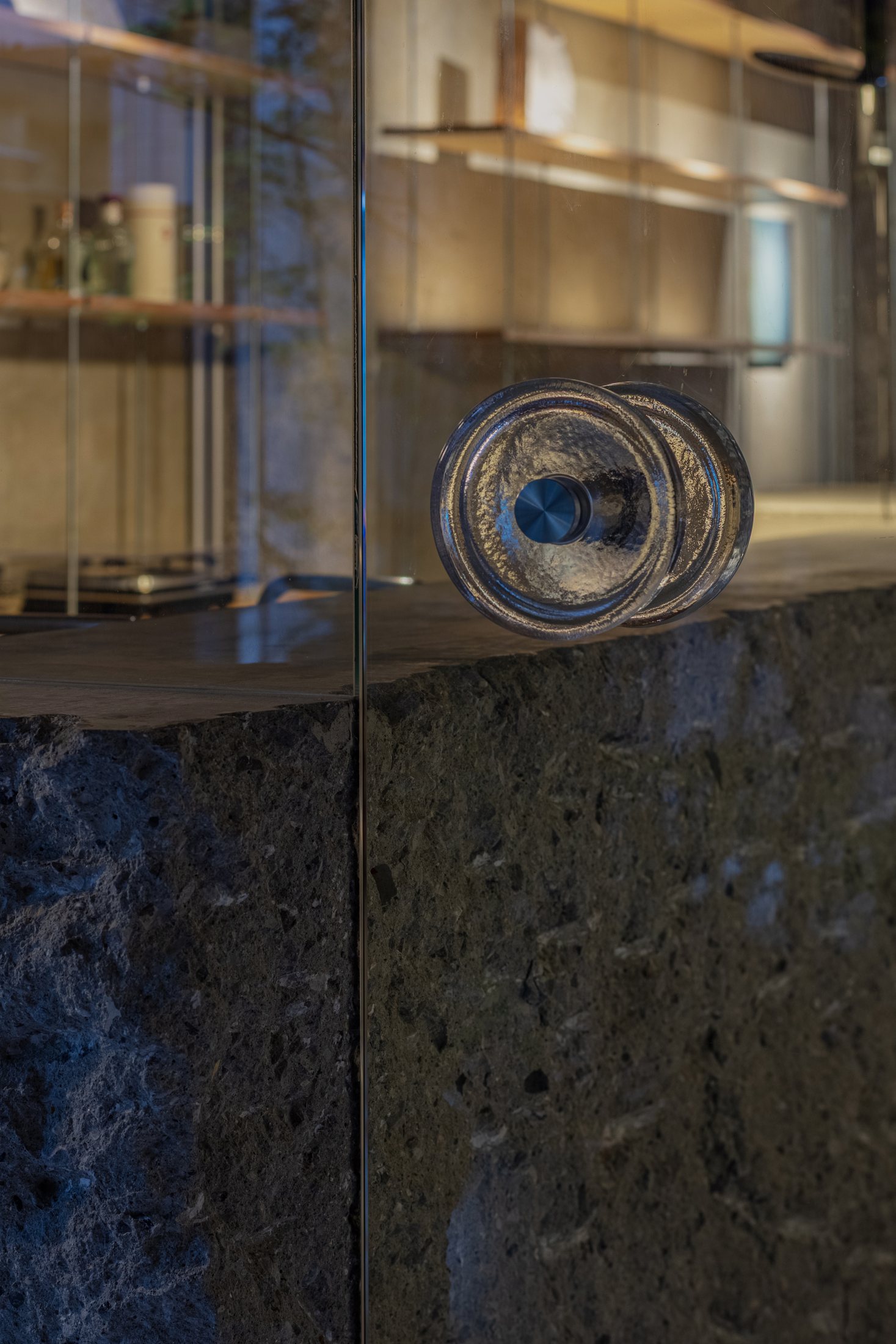 Pendant lighting and display shelf detail at Maniwa