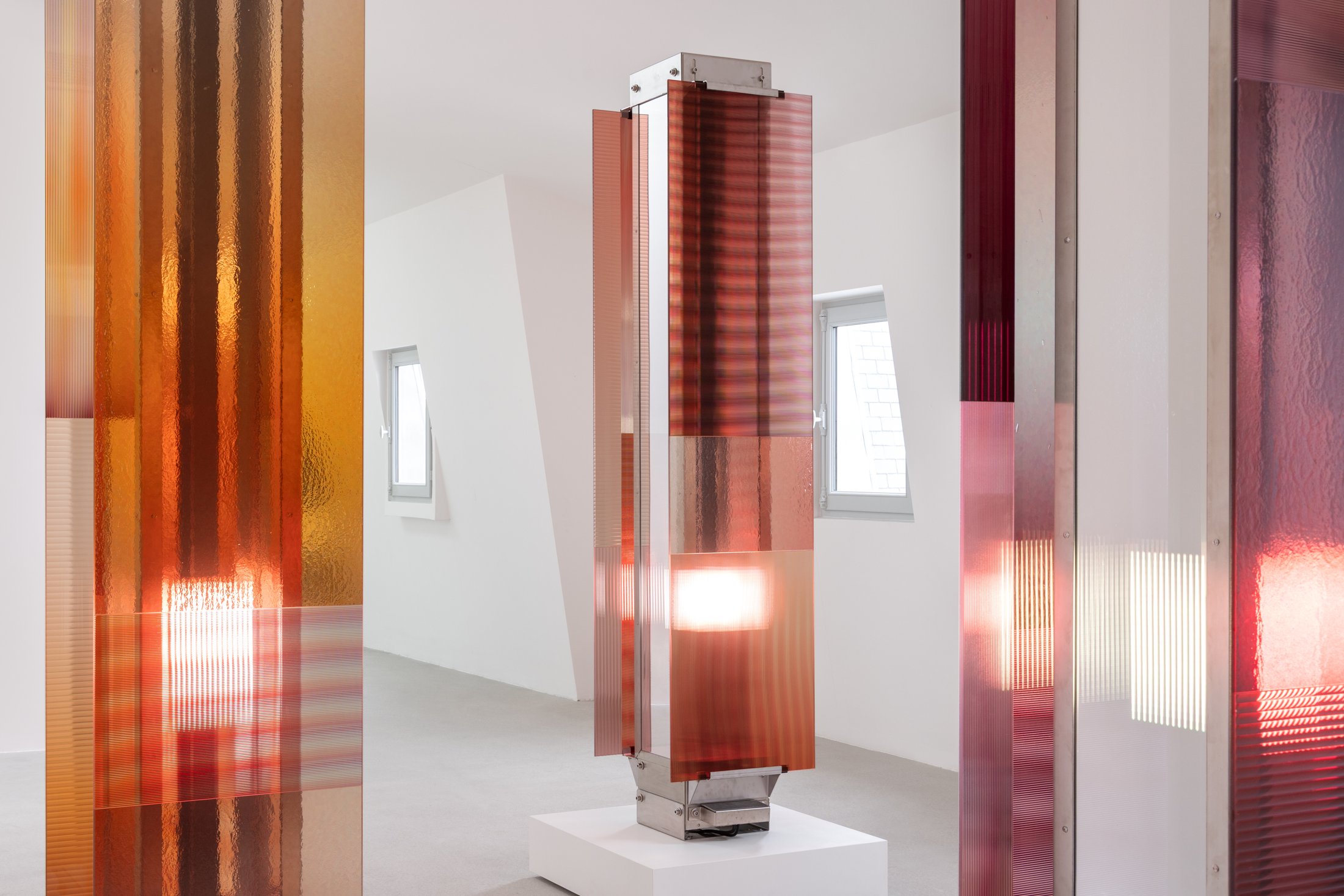 Coloured glass columns of Rive Roshan’s Garden of Hope at BOON_MONCEAU, Paris