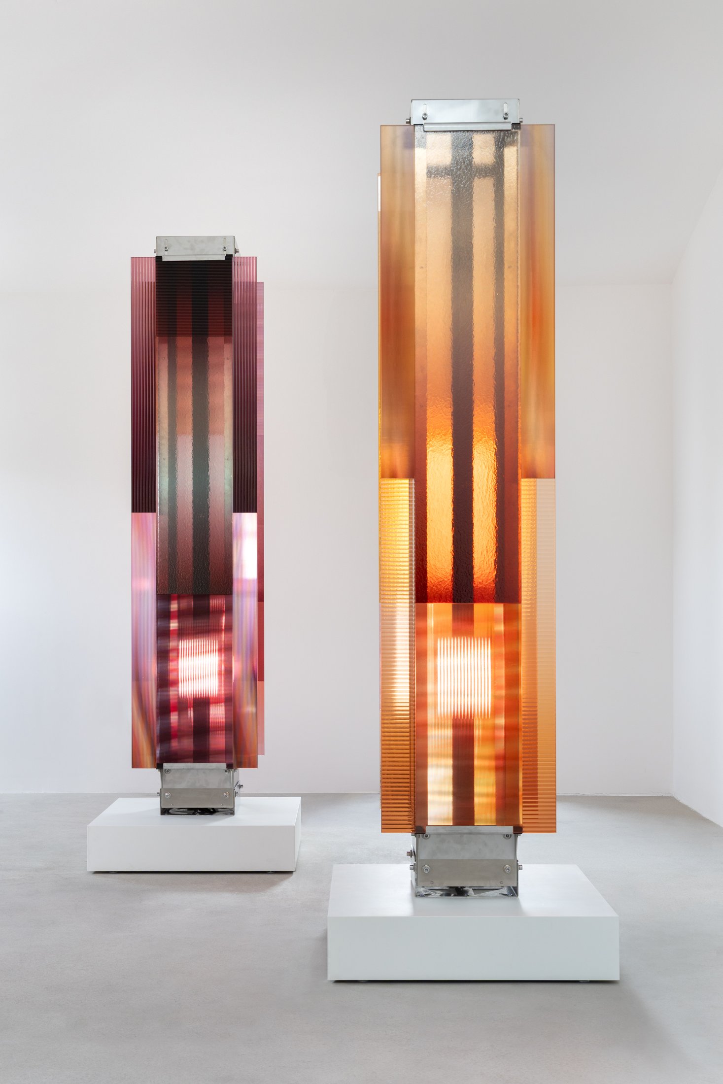 Moving light behind amber and rose glass in Garden of Hope at BOON_MONCEAU