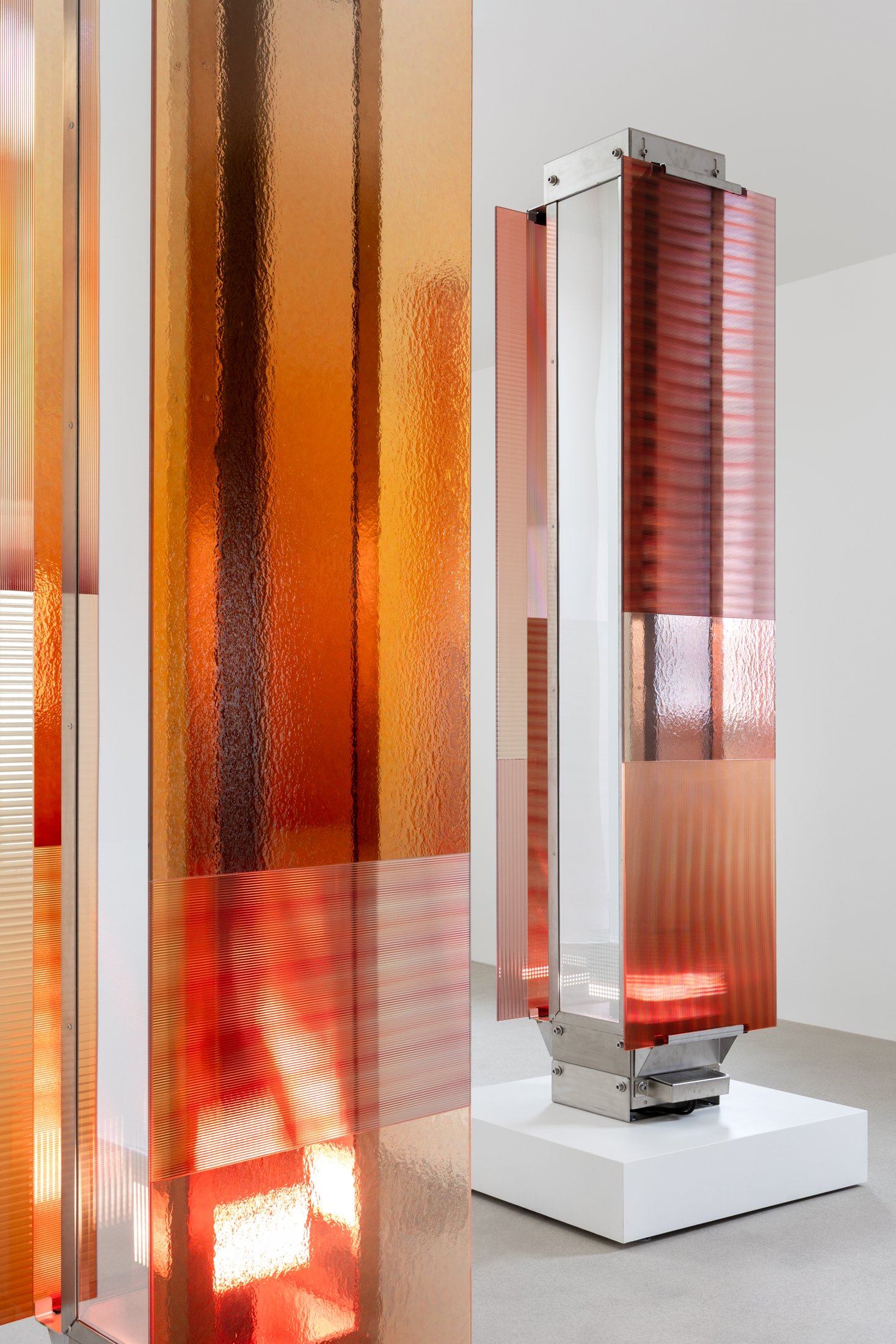 Moving light behind amber and rose glass in Garden of Hope at BOON_MONCEAU