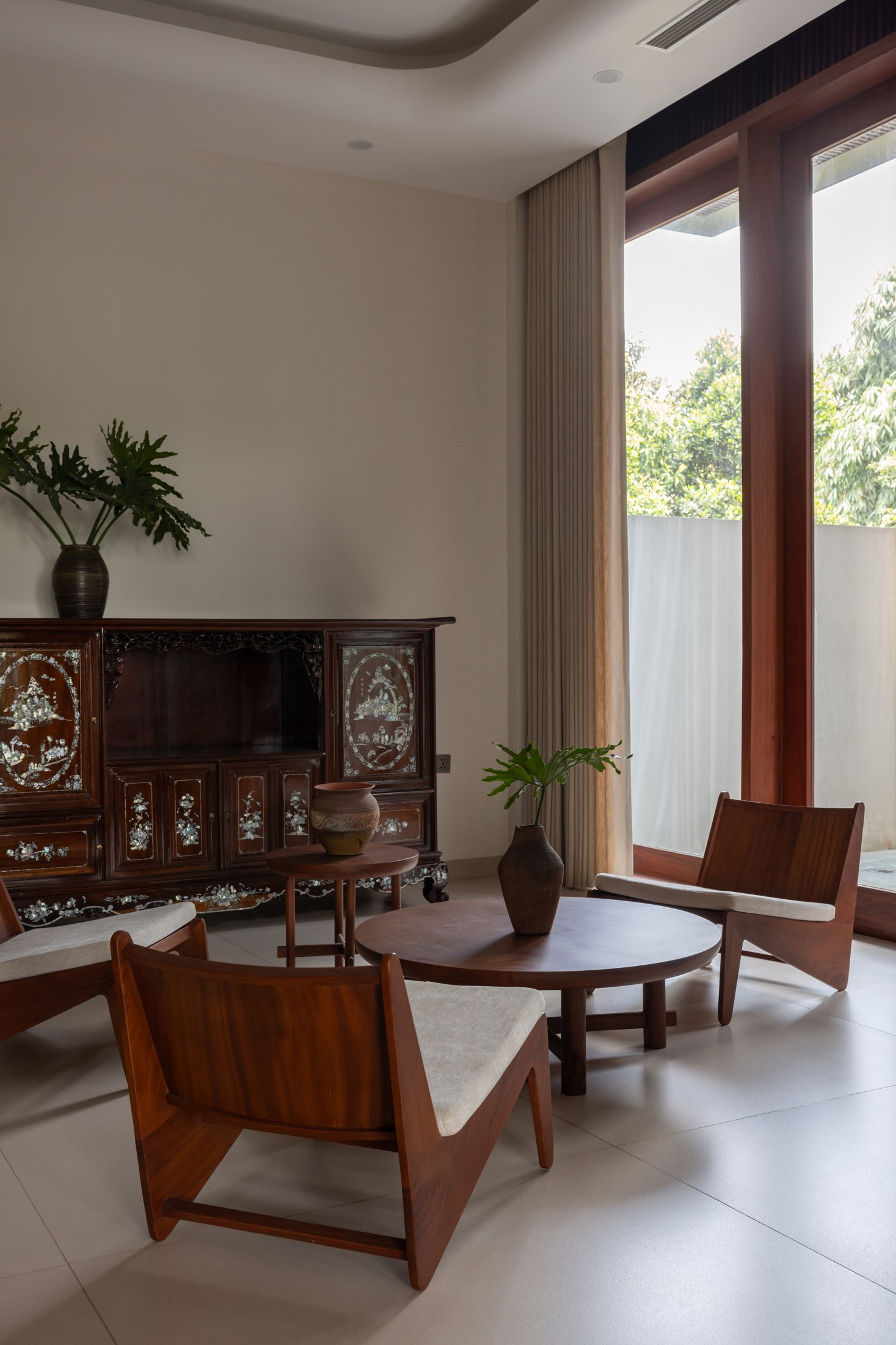 Interior and timber detailing at Hong Tien Garden Villa by COTAM Studio