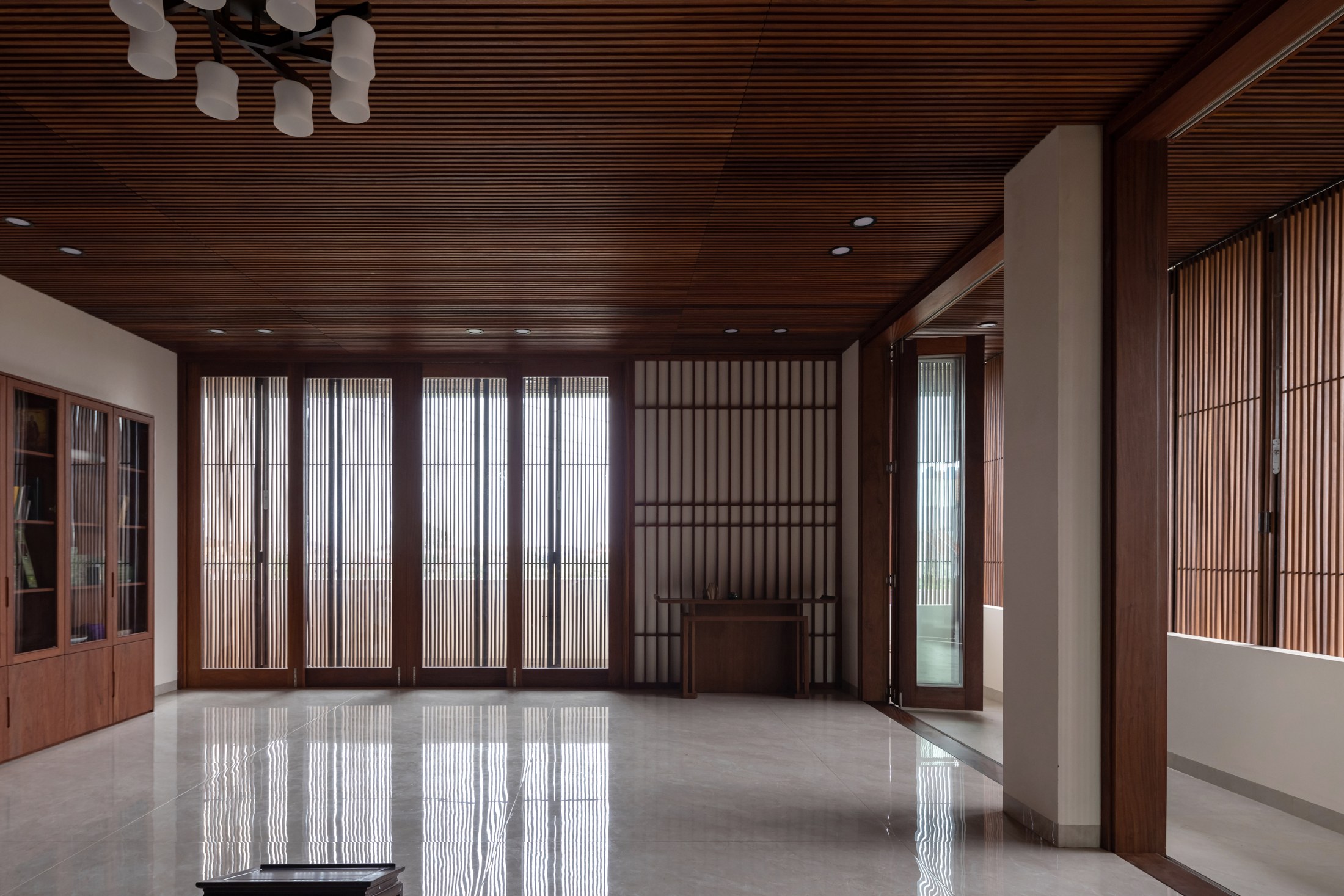 Interior and timber detailing at Hong Tien Garden Villa by COTAM Studio