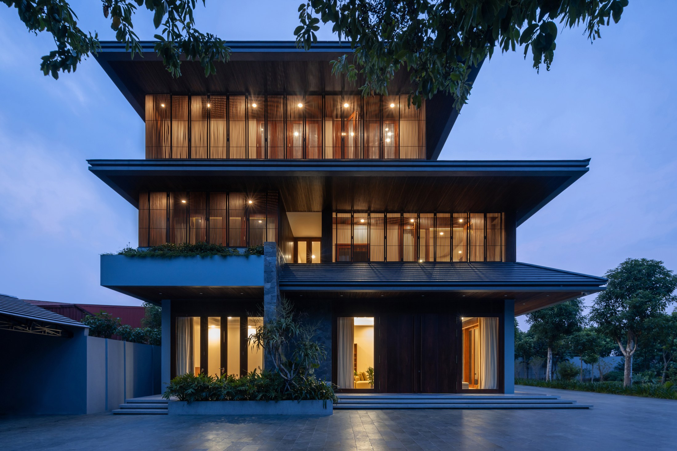 Interior and timber detailing at Hong Tien Garden Villa by COTAM Studio