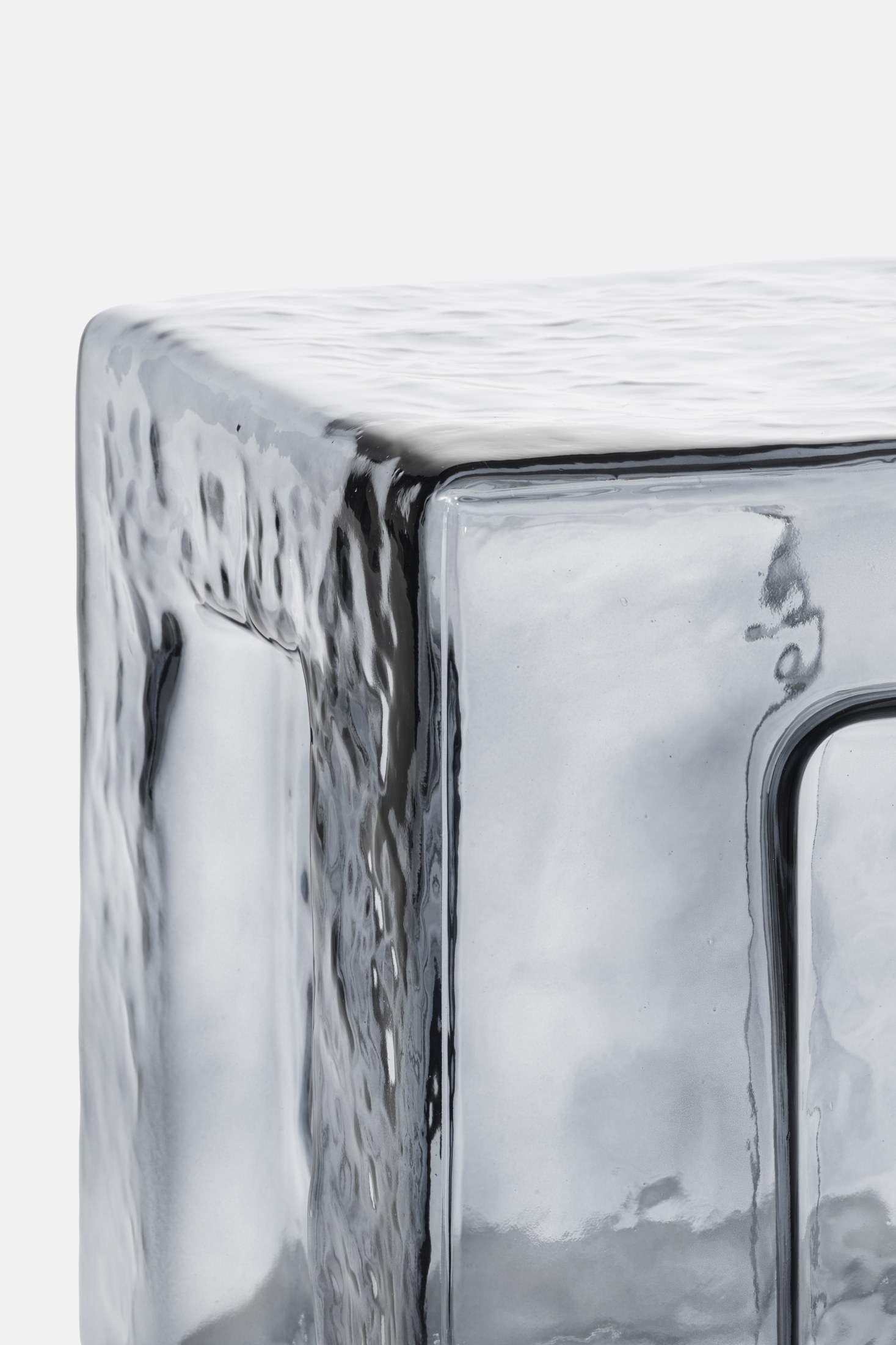 Detail of the rippled hand-blown glass surface of 6:AM Batch