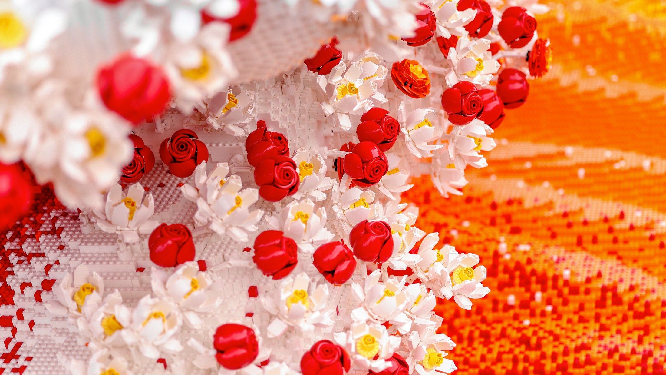 Close-up of white and red LEGO flowers