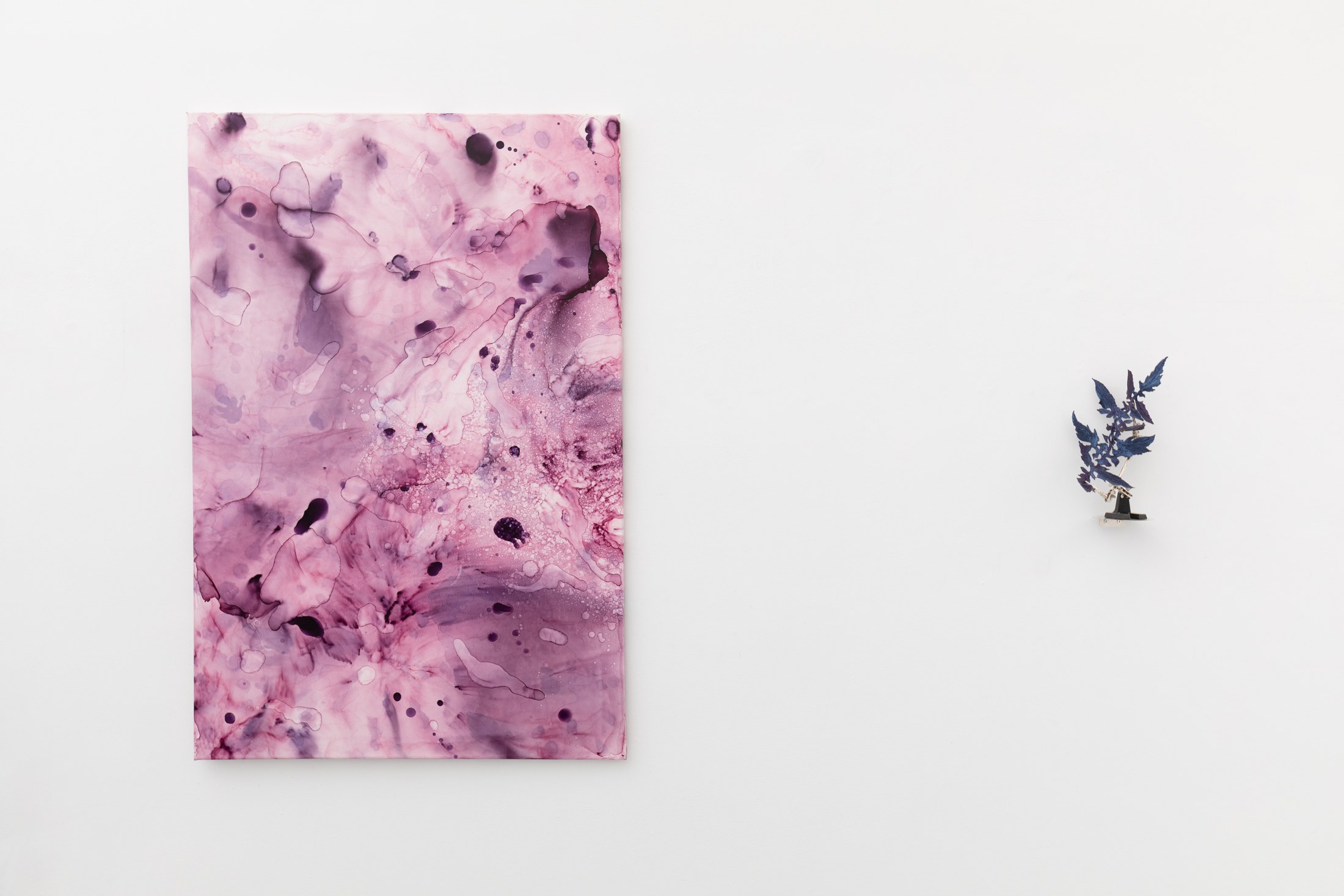 Large pink painting with dark branching wall object
