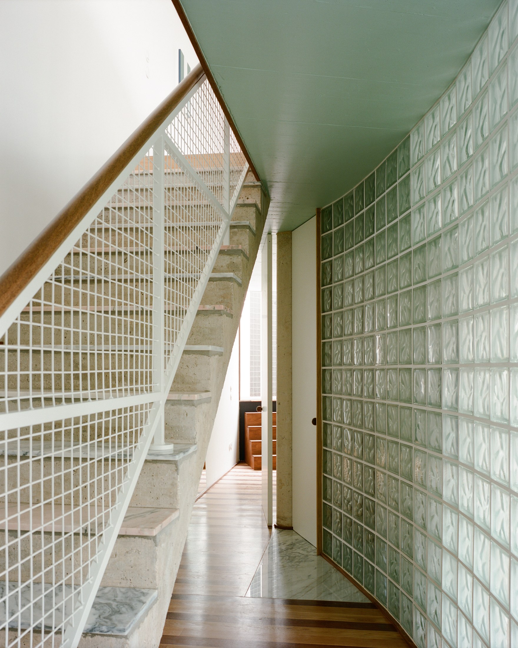 entrance hall at House around a column by fala