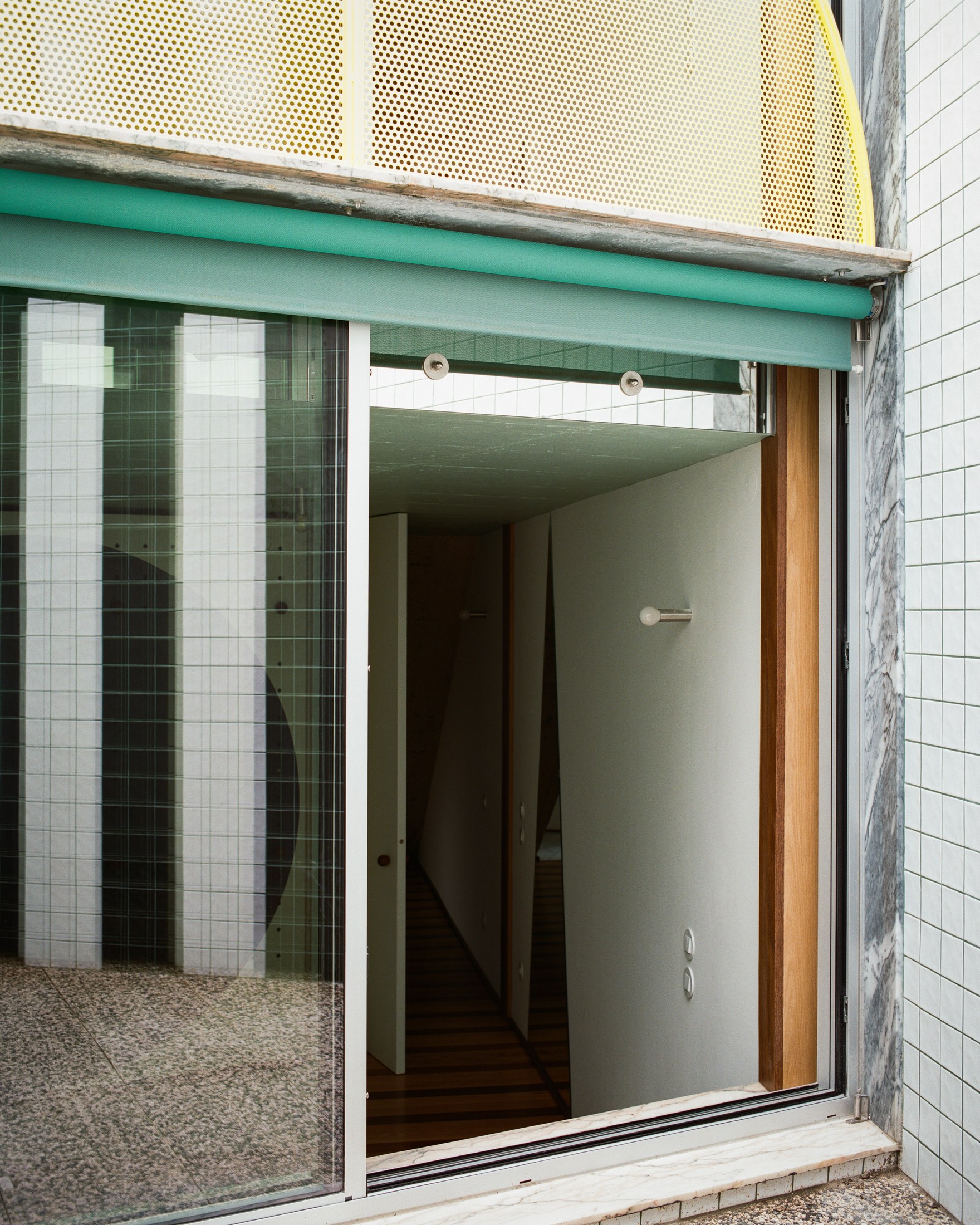 back facade detail at House around a column by fala