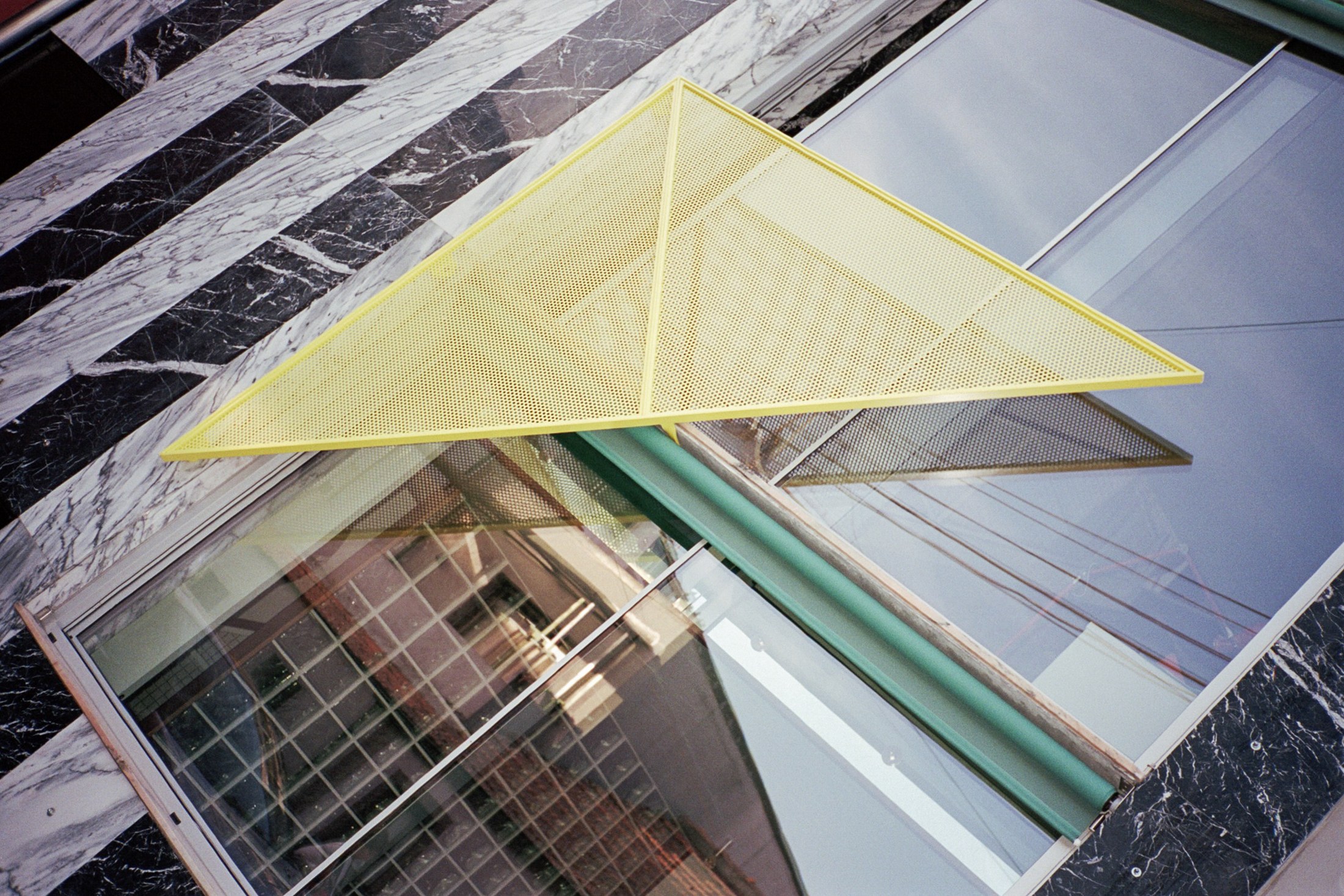 facade detail at House around a column by fala