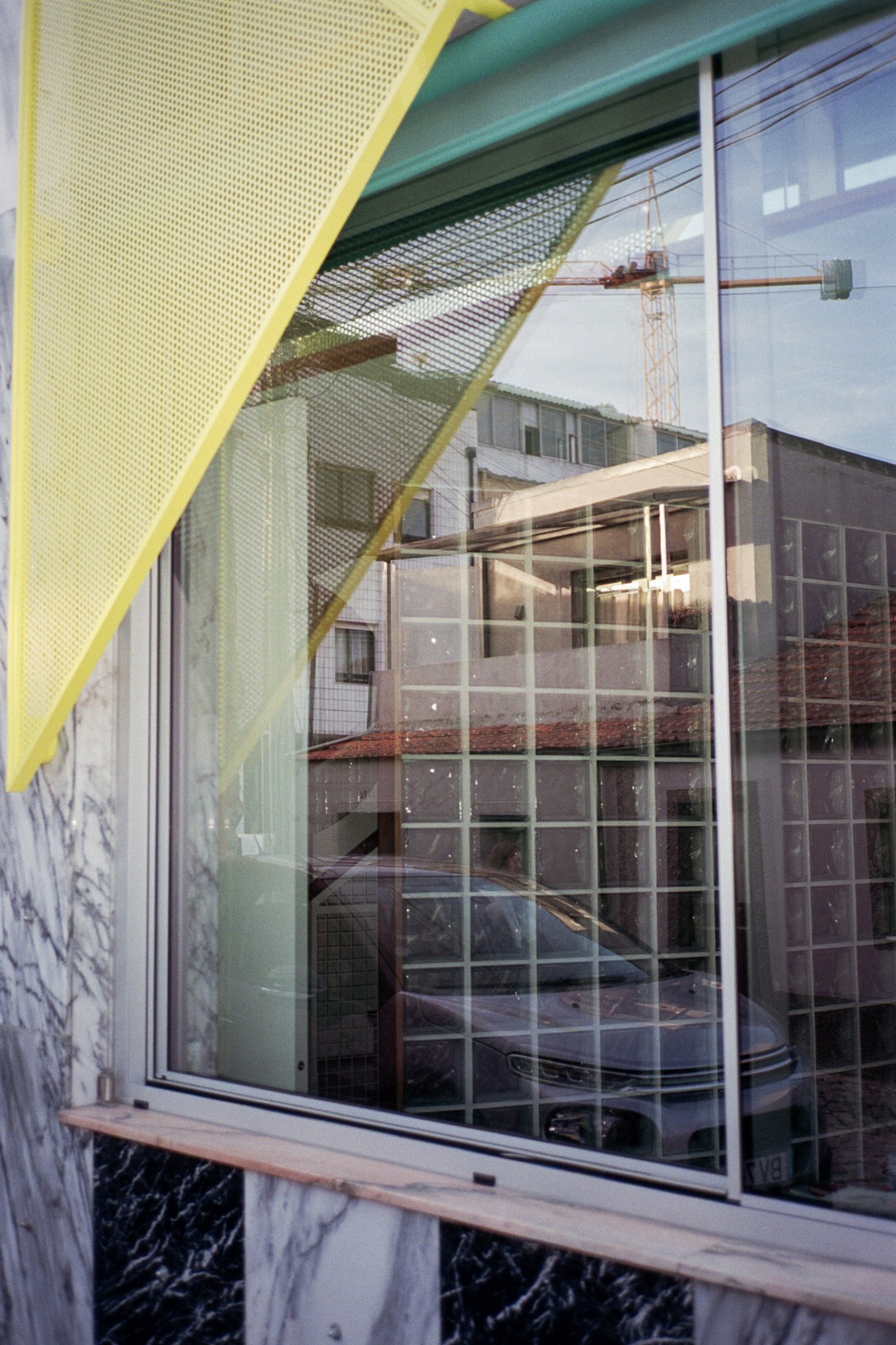 facade detail at House around a column by fala