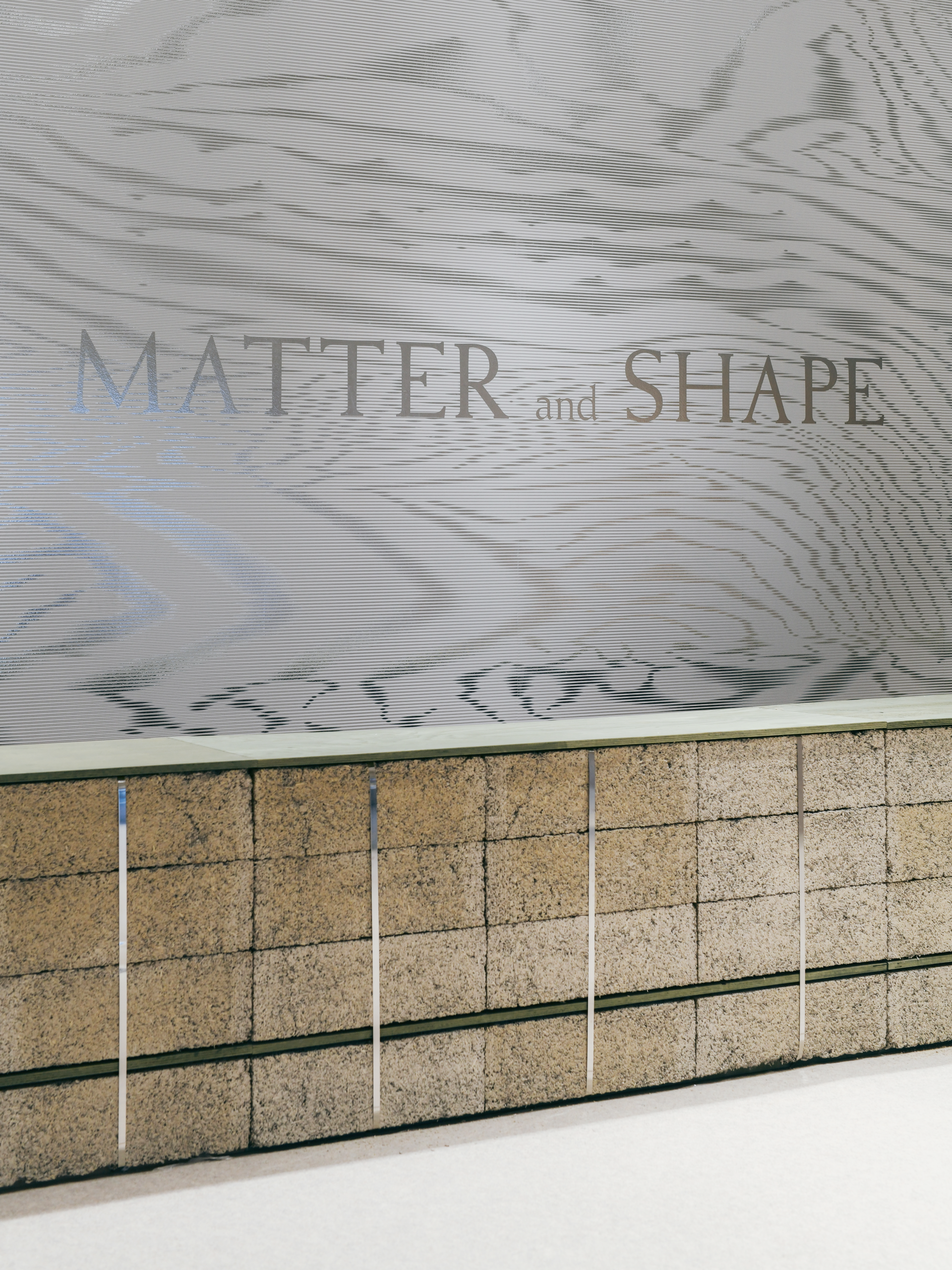 Detail of the MATTER and SHAPE reception counter and moiré graphics