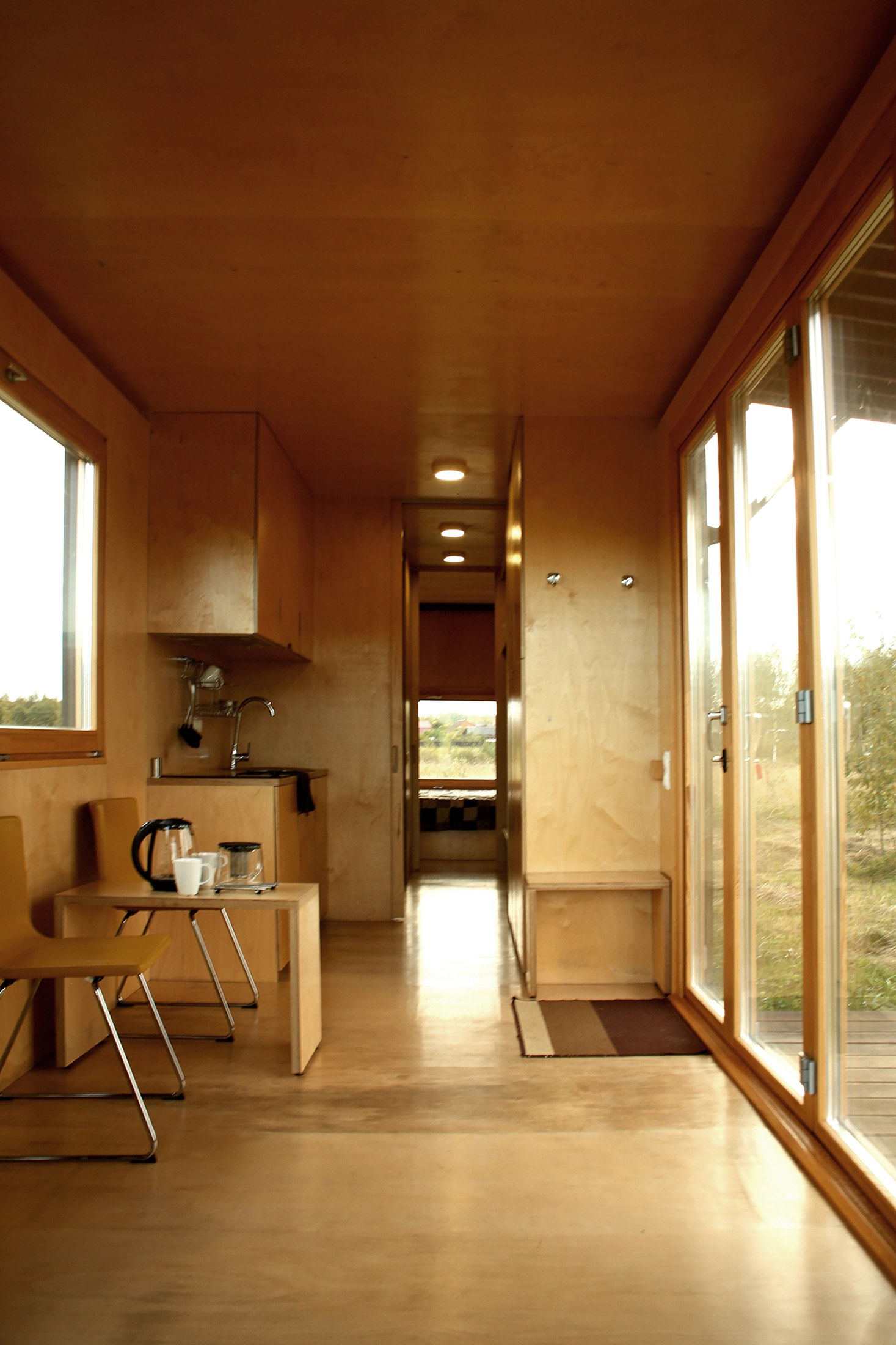 View through the plywood-lined living area