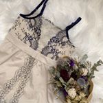 ♡♡♡♡♡**これブラジャーの上から着けるキャミソールなんだけど、実は補正下着なの🤭❤.アイボリーにネイビーの繊細なレースがとってもお洒落で上品だから全然補正下着に見え&hellip;のInstagram画像