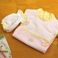 「たれても安心スマイリーちゃんお食事エプロン（株式会社グースカンパニー）」の商品画像