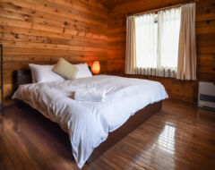 3 Bedroom Log House with property vehicle