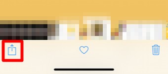 写真アプリの「↑」をタップ