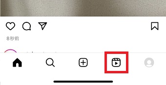 四角の中に三角があるマーク